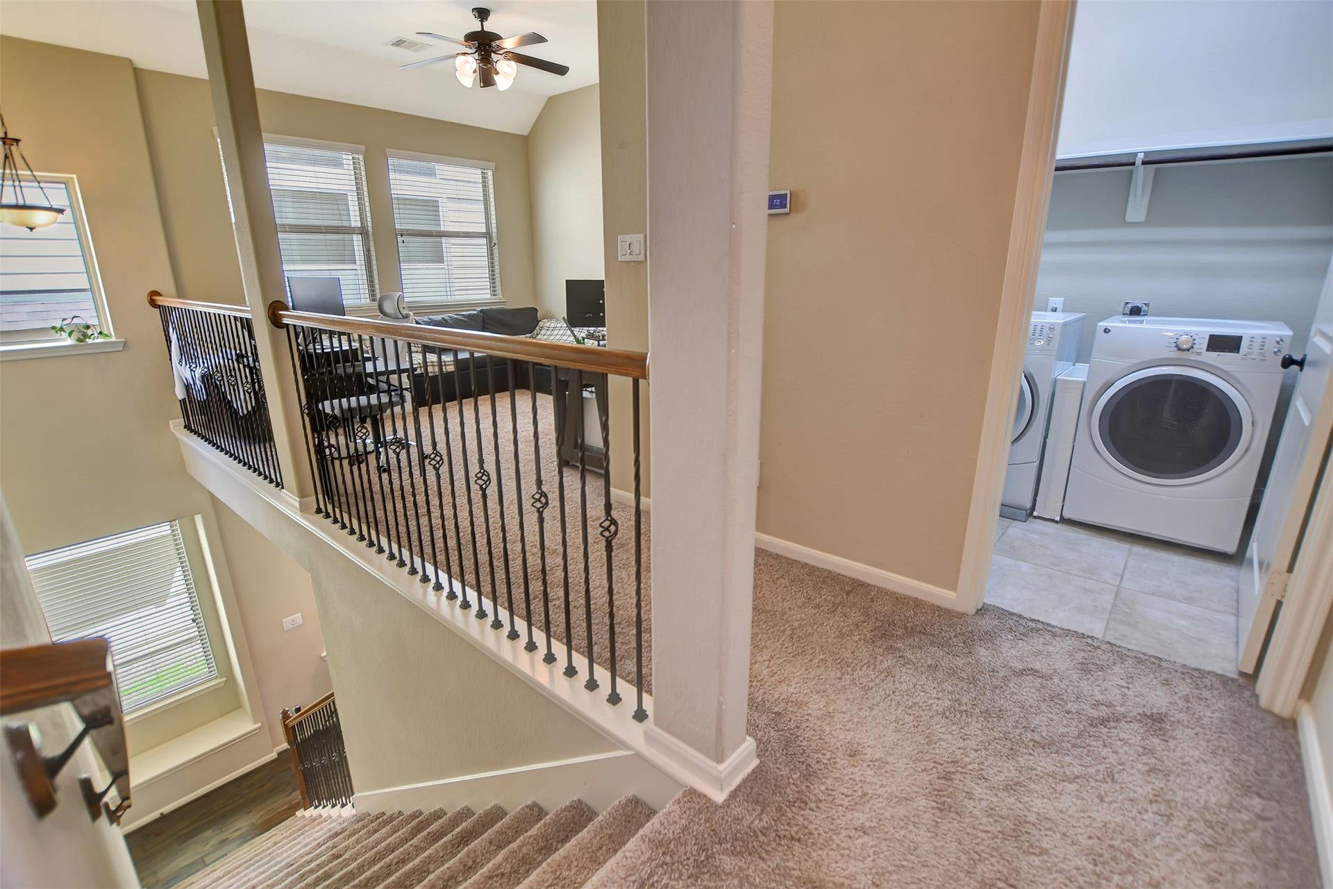Standing area, laundry room to the right.