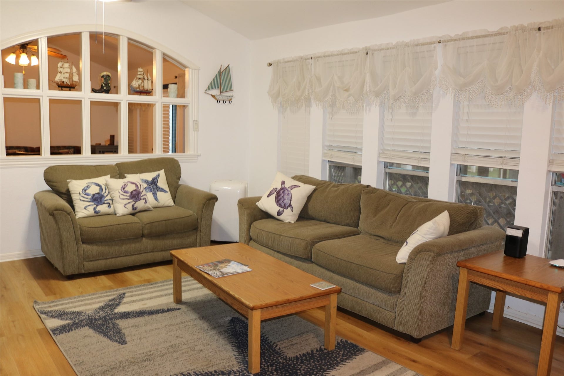 13002 Buccaneer Parkway, Freeport, TX 77541 Cozy living area perfect for family gatherings and relaxation.
