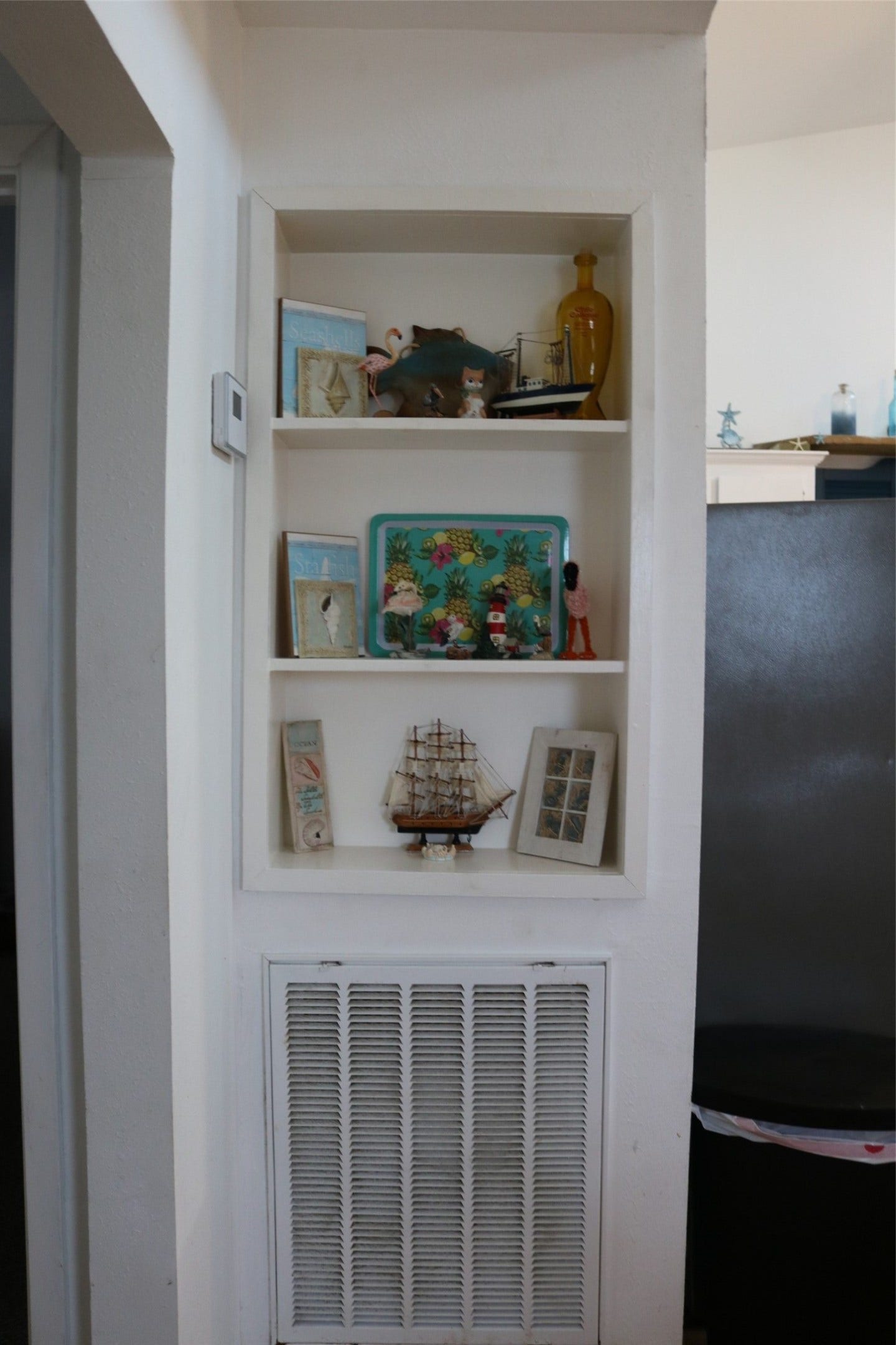 13002 Buccaneer Parkway, Freeport, TX 77541 Cozy kitchen nook with built-in shelving for added charm and storage.