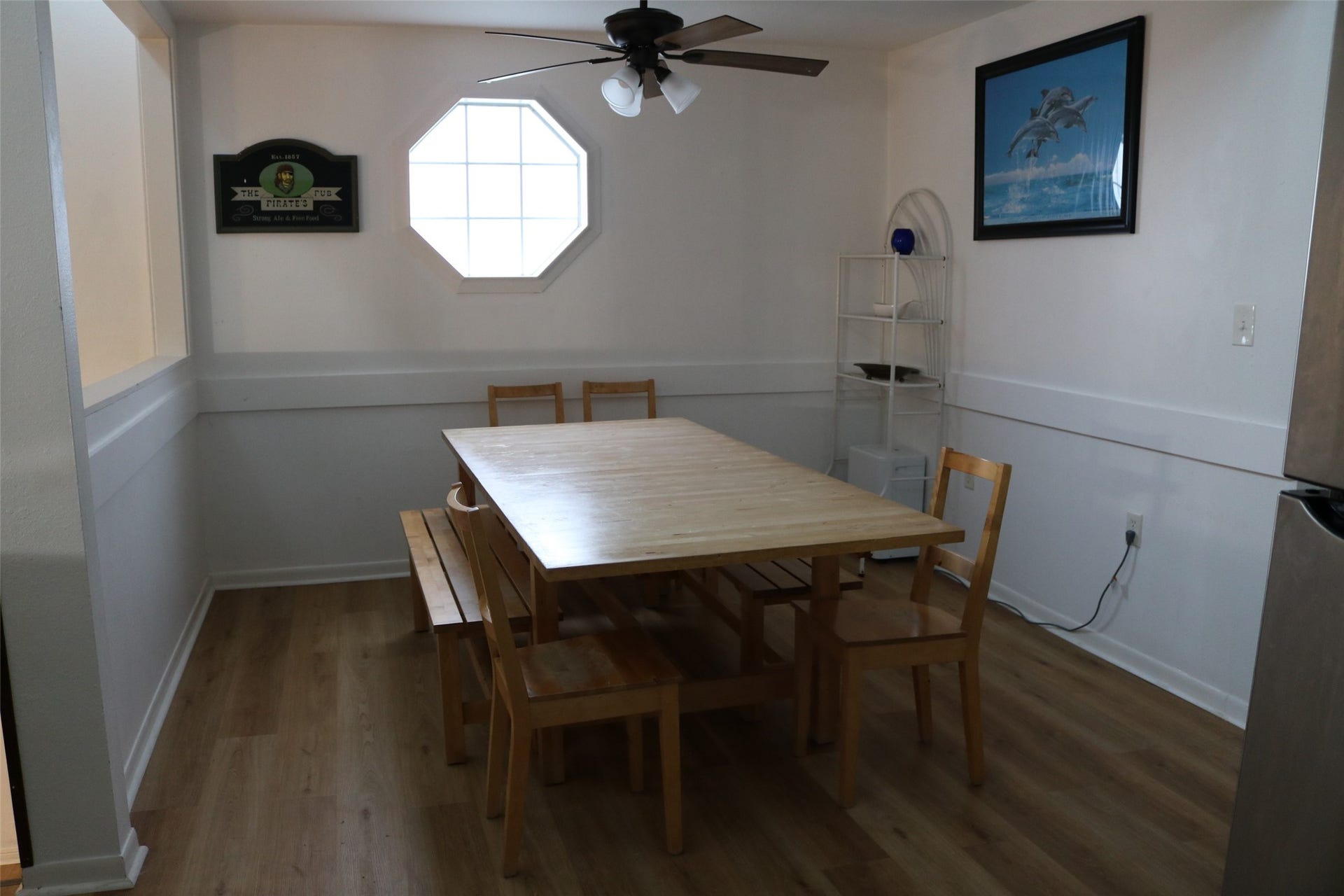 13002 Buccaneer Parkway, Freeport, TX 77541 Bright dining area adjacent to the kitchen, featuring a cozy setting with ample natural light.