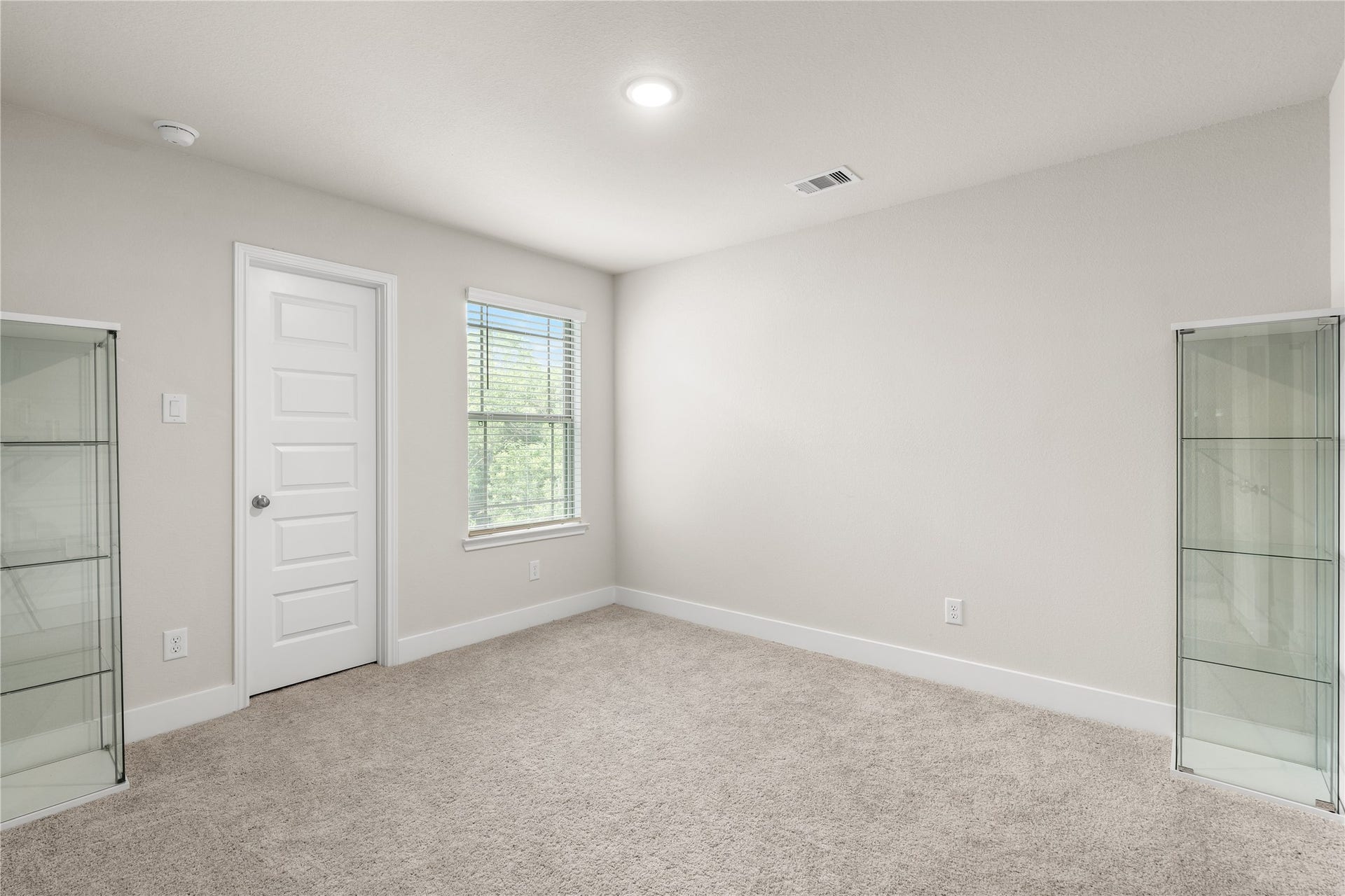 4001 Baja Lane, Houston, TX 77045 Comfortably proportioned with a large window and walk-in closet, this secondary bedroom is designed to adapt to changing needs over time.