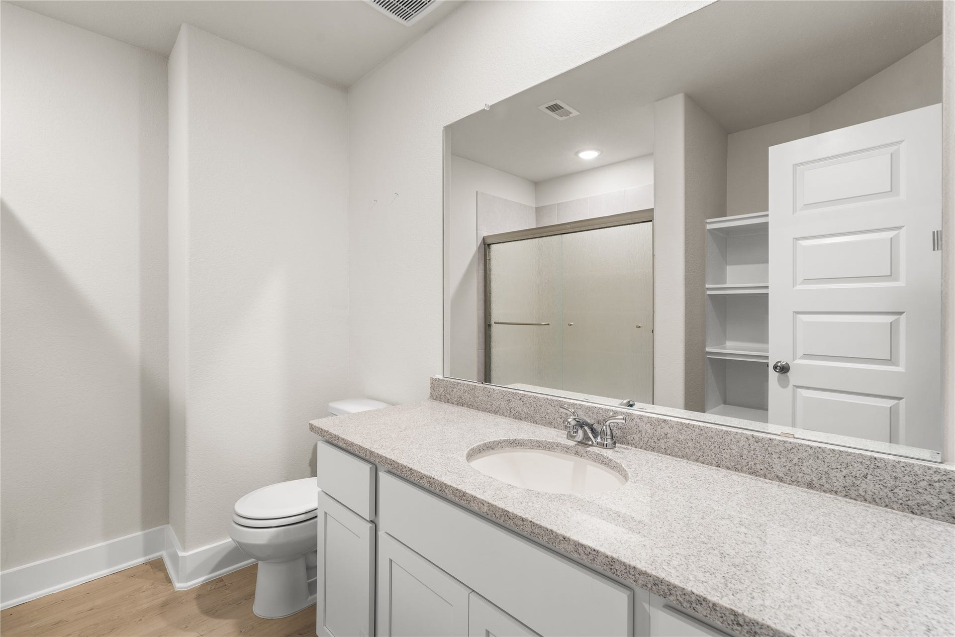4001 Baja Lane, Houston, TX 77045 Designed to comfortably serve the secondary bedrooms, this full bath features generous counter space, built-in linen storage, and a layout that keeps daily routines running smoothly.