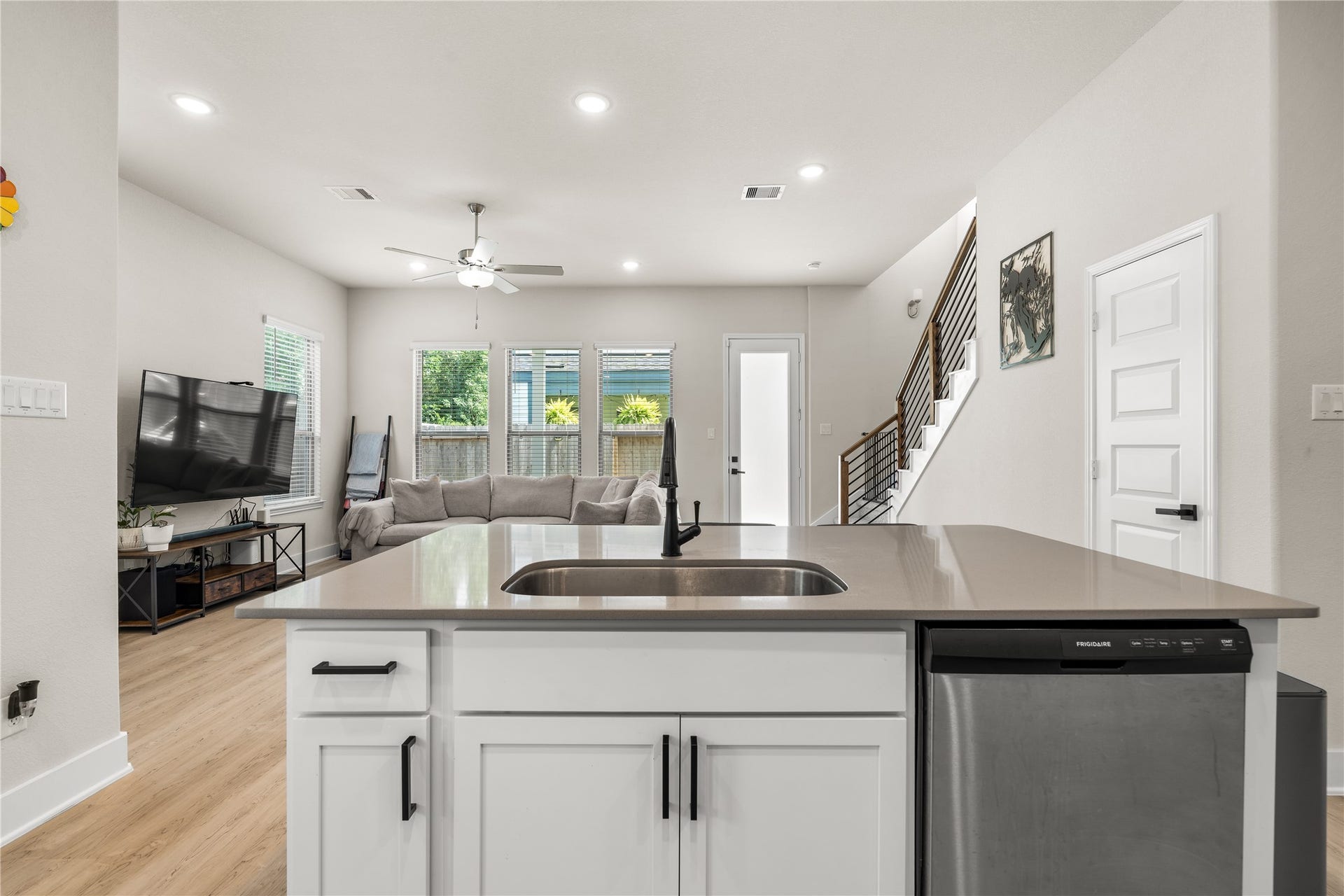 4001 Baja Lane, Houston, TX 77045 From the kitchen island, the home's most important spaces remain within view, creating a layout that feels connected, practical, and well-suited for everyday life.
