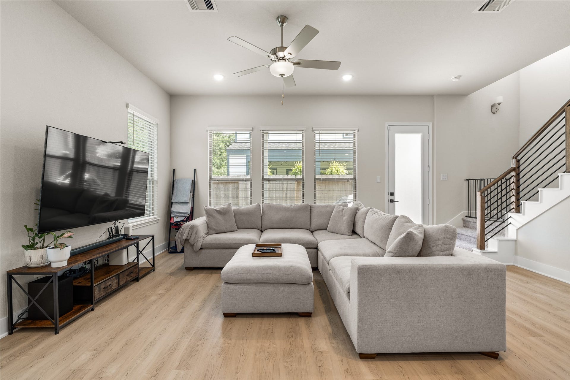 4001 Baja Lane, Houston, TX 77045 Generous proportions allow the living room to comfortably accommodate larger furnishings while preserving an open, uncluttered feel throughout the space.