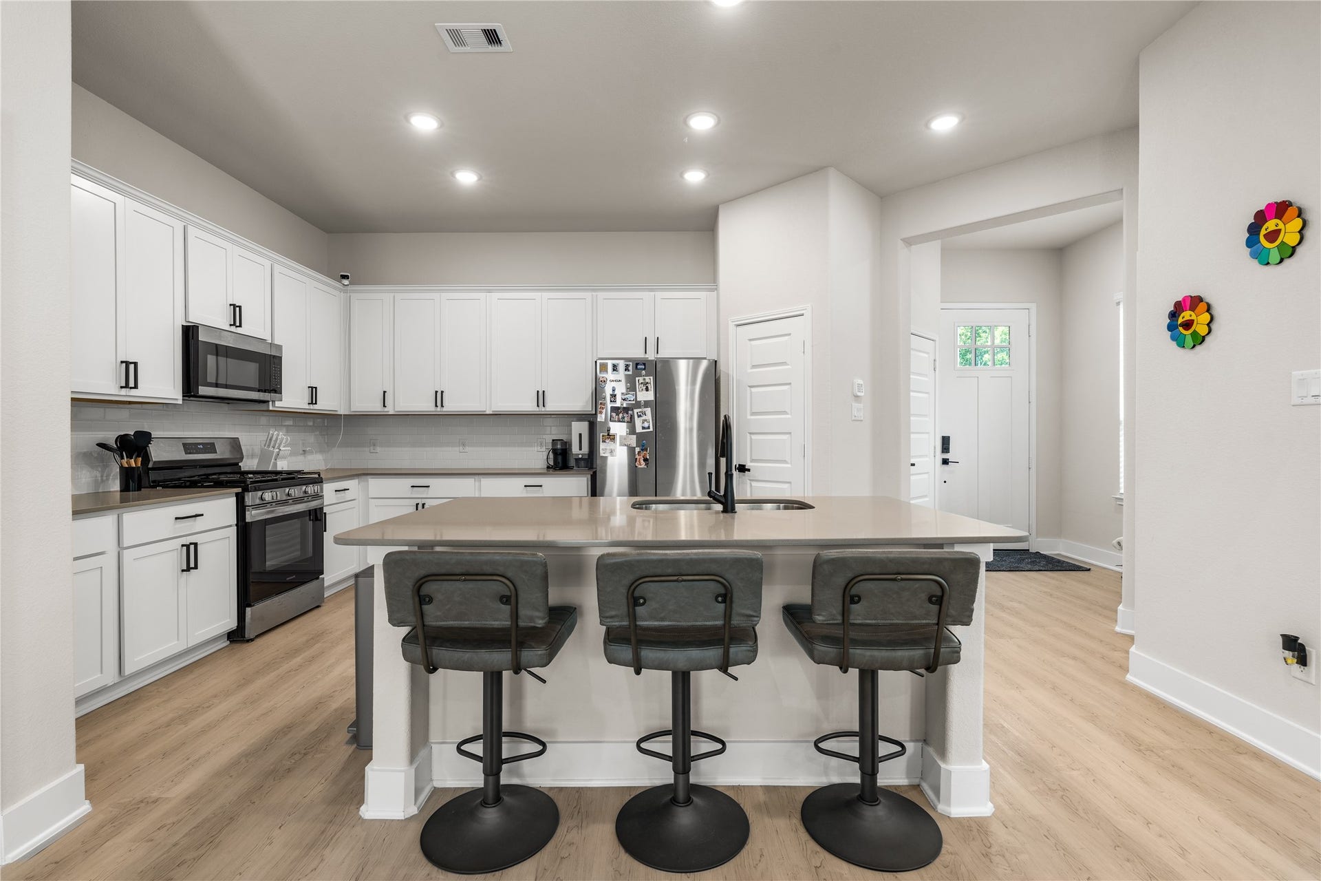 4001 Baja Lane, Houston, TX 77045 Designed to keep everyday life connected, the main living spaces flow seamlessly together, allowing conversation, meal preparation, and gathering to happen naturally from the moment you walk through the door.