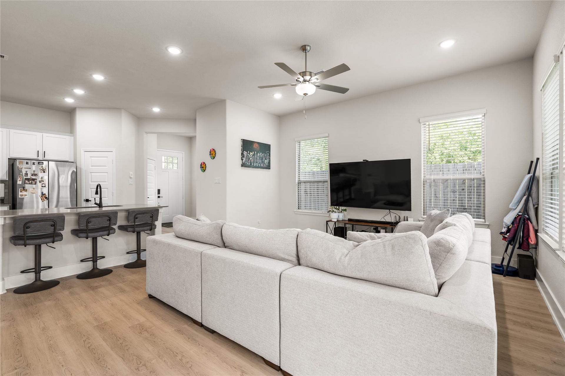 4001 Baja Lane, Houston, TX 77045 The seamless connection between the kitchen and living area creates a sense of openness that makes the home feel larger than its footprint, while still maintaining distinct spaces for gathering and relaxing.