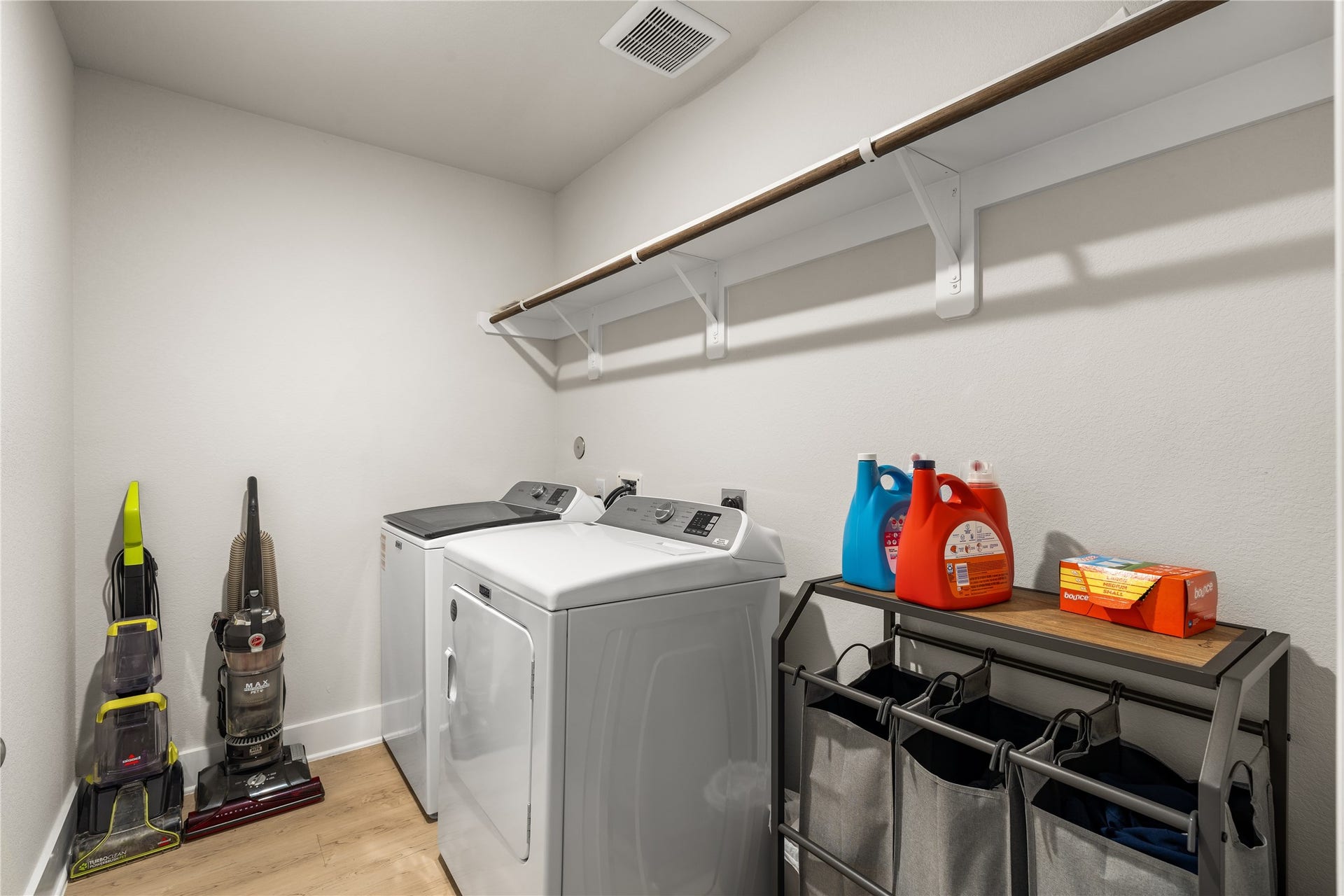 4001 Baja Lane, Houston, TX 77045 Thoughtfully tucked away from the main living areas, the dedicated laundry room offers ample space for sorting, storage, and keeping everyday tasks organized.