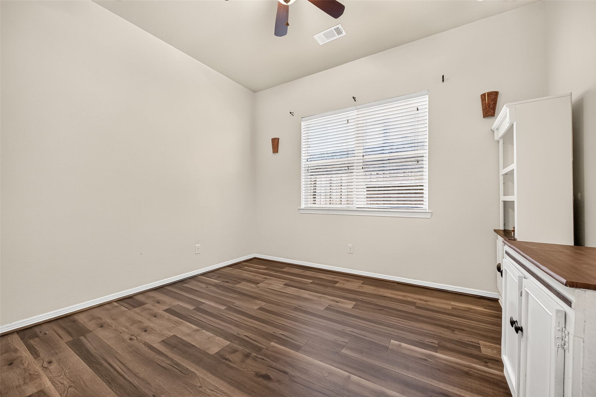 4314 Kent Ranch Court, Katy, TX 77494 Secondary bedroom with ceiling fan and large window.