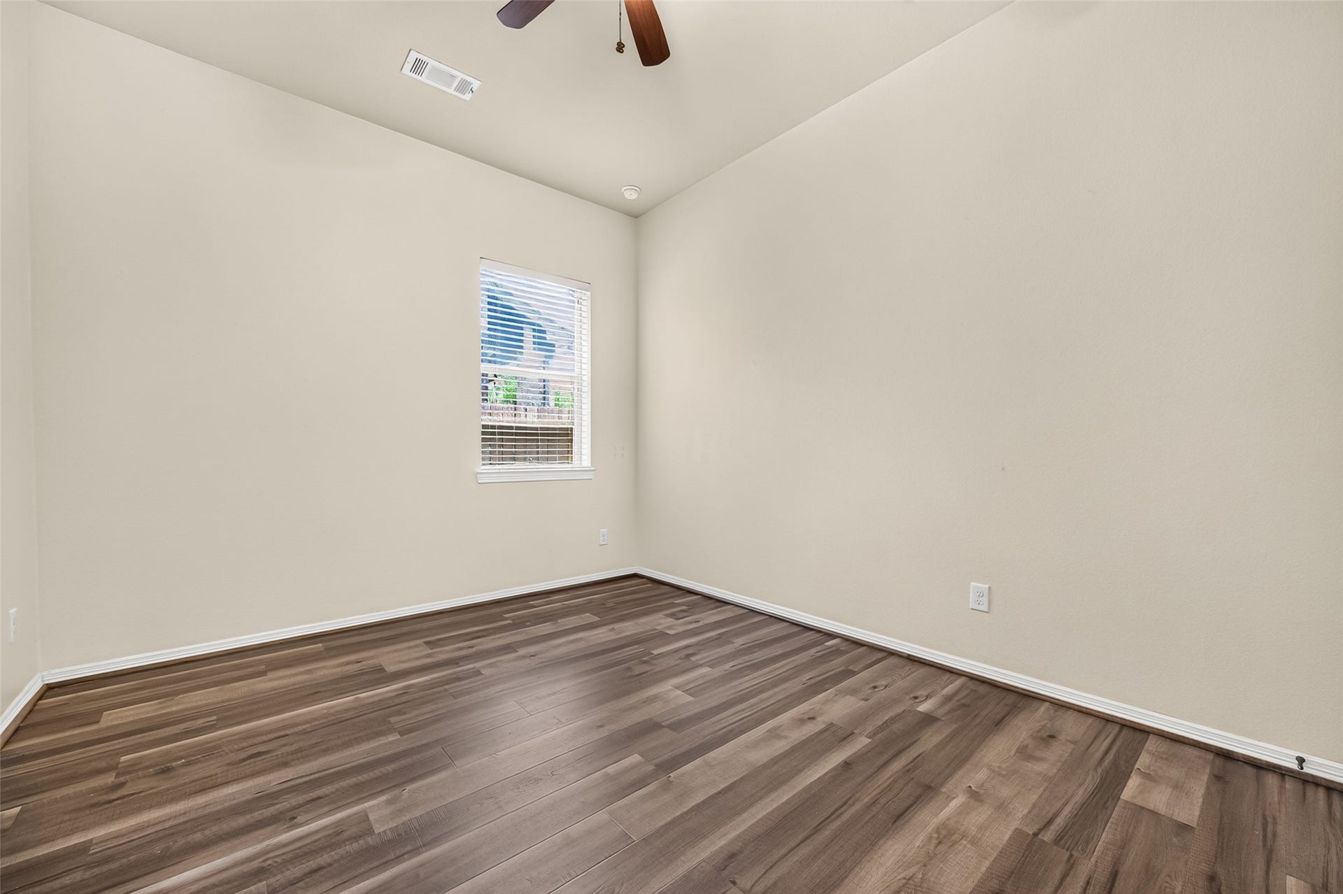 4314 Kent Ranch Court, Katy, TX 77494 Secondary bedroom with ceiling fan and window.