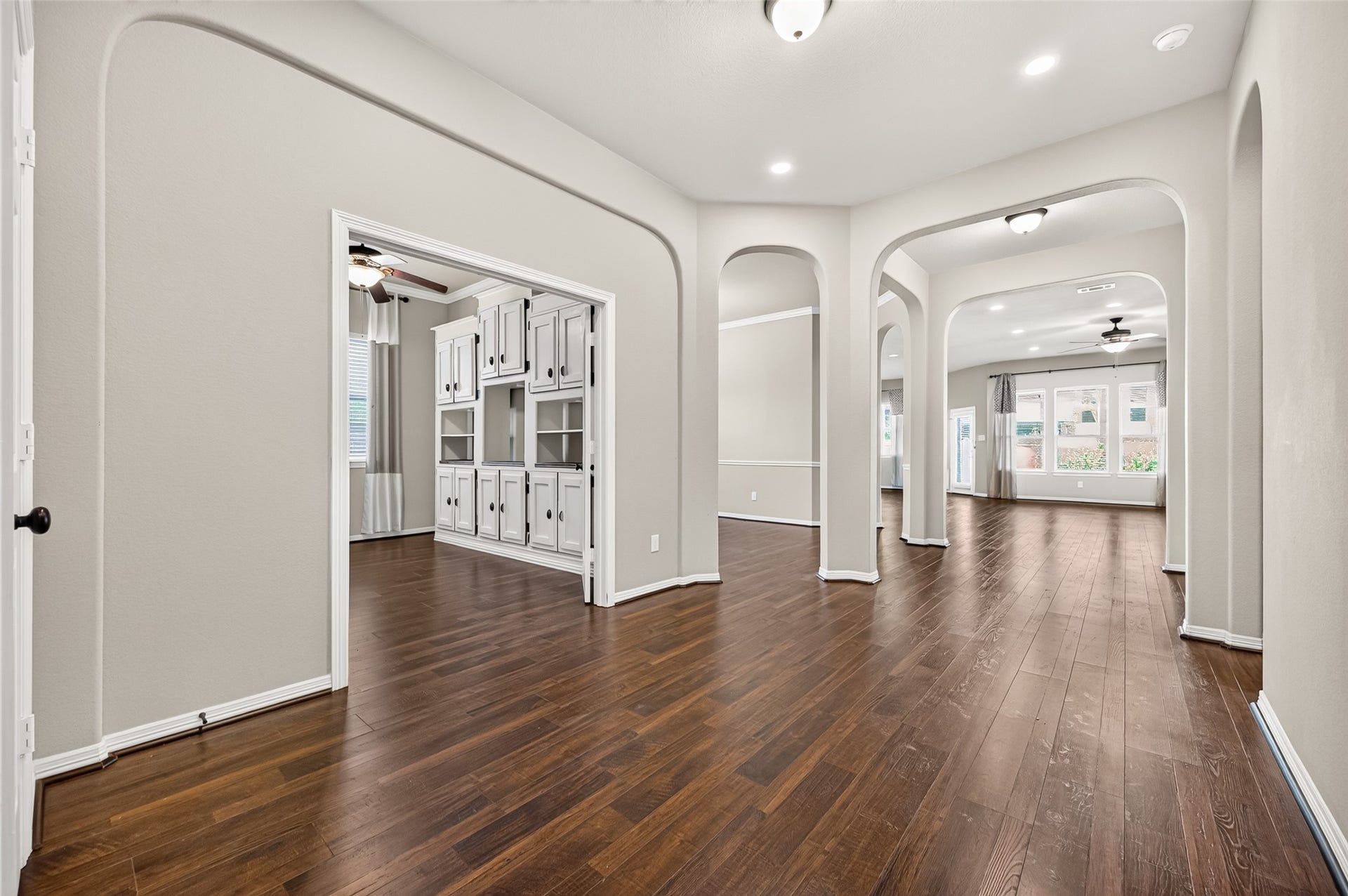 4314 Kent Ranch Court, Katy, TX 77494 Entry hall with arched openings to the study and formal dining room.