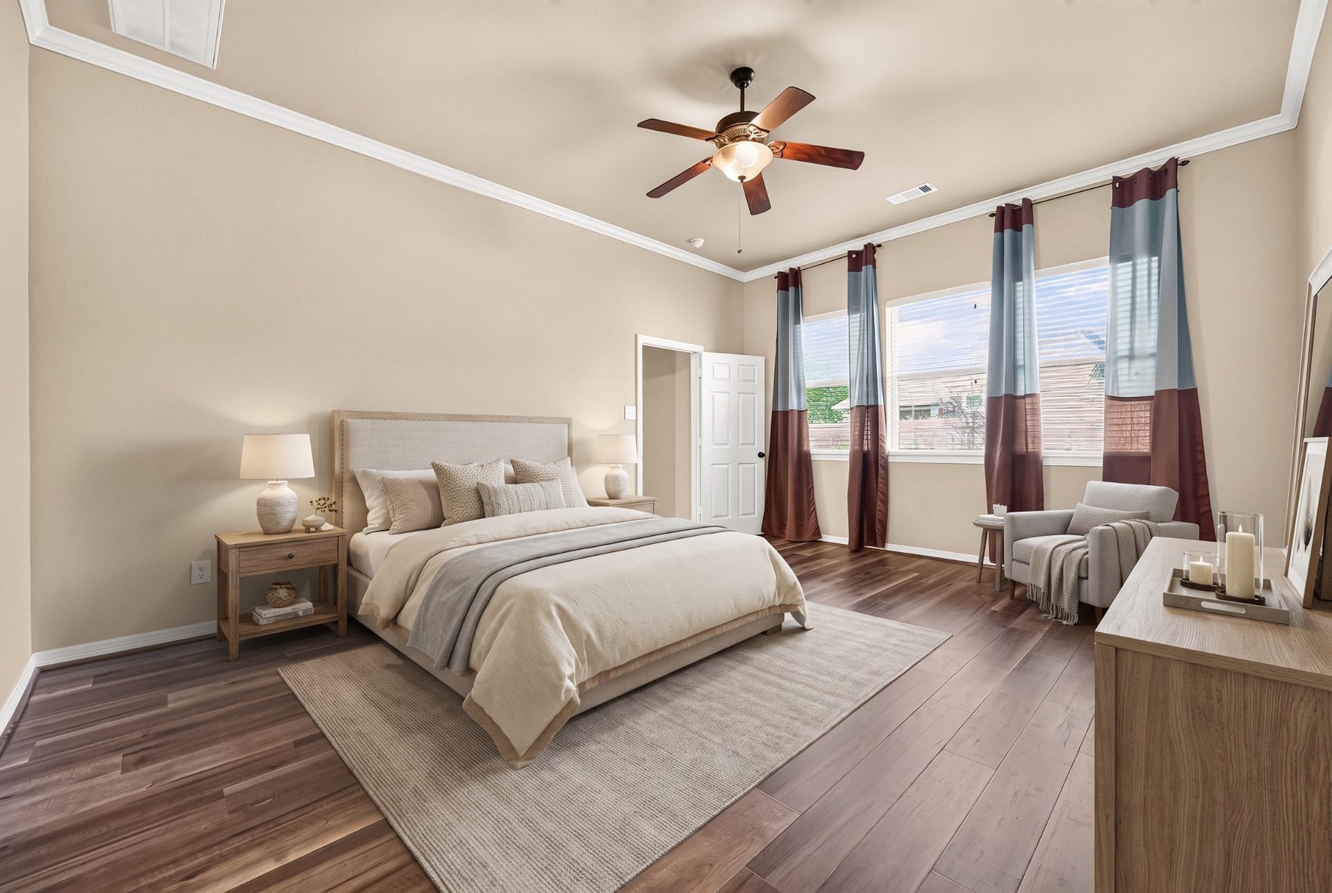 4314 Kent Ranch Court, Katy, TX 77494 Virtually staged primary bedroom with ceiling fan, crown molding, wood-look flooring and a wall of windows.