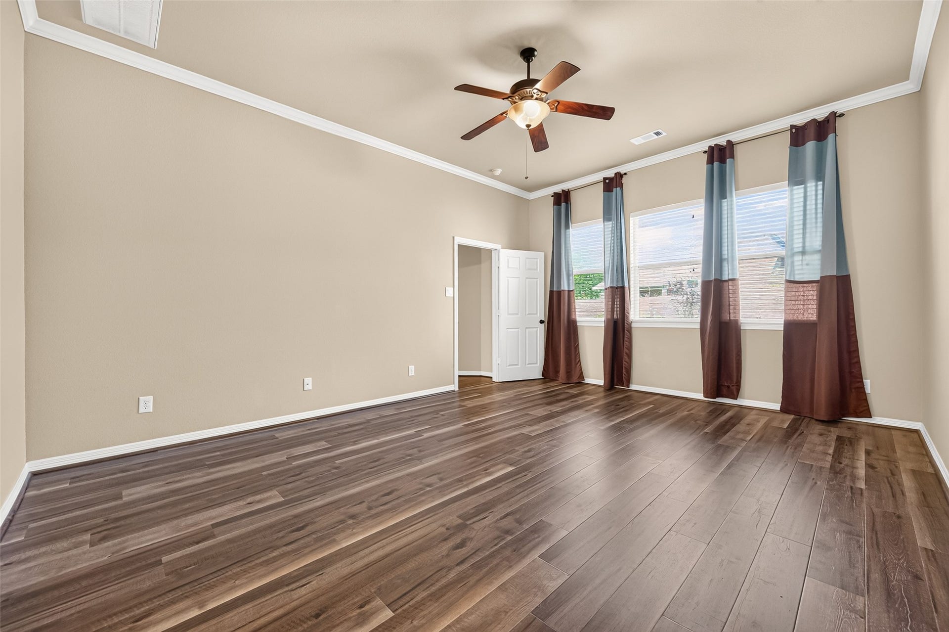 4314 Kent Ranch Court, Katy, TX 77494 Primary bedroom, alternate view showing generous floor space and natural light.