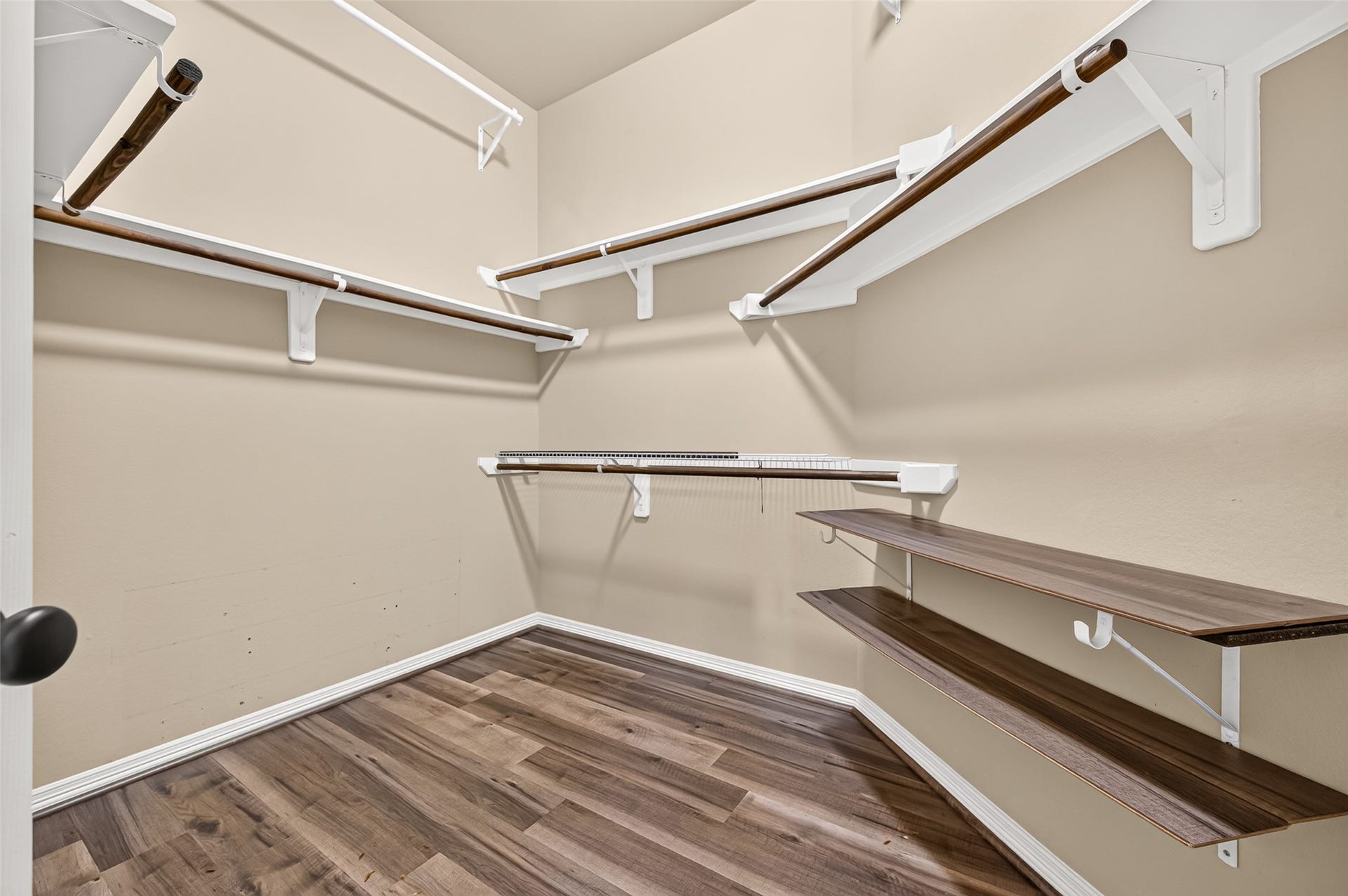 4314 Kent Ranch Court, Katy, TX 77494 Primary walk-in closet with multiple hanging rods and shelving.