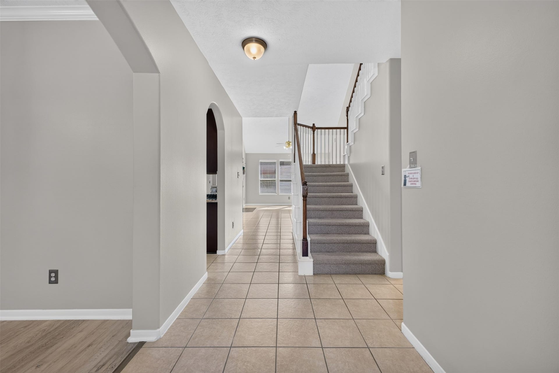 1011 Jasons Bend Drive, Sugar Land, TX 77479 The entryway leads to the living room.