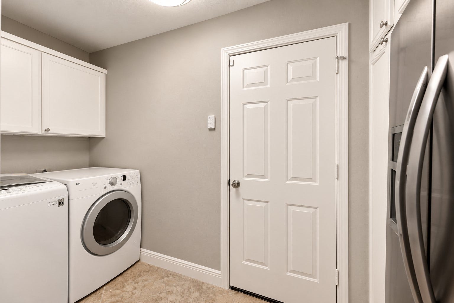 2713 N Logrun Circle, Spring, TX 77380 ust off the Mudroom, the Laundry Room offers space for a full-size washer & dryer plus a second refrigerator, with generous built-in cabinetry for household storage. Direct access to the garage makes everyday arrivals, groceries & busy schedules a little easier.