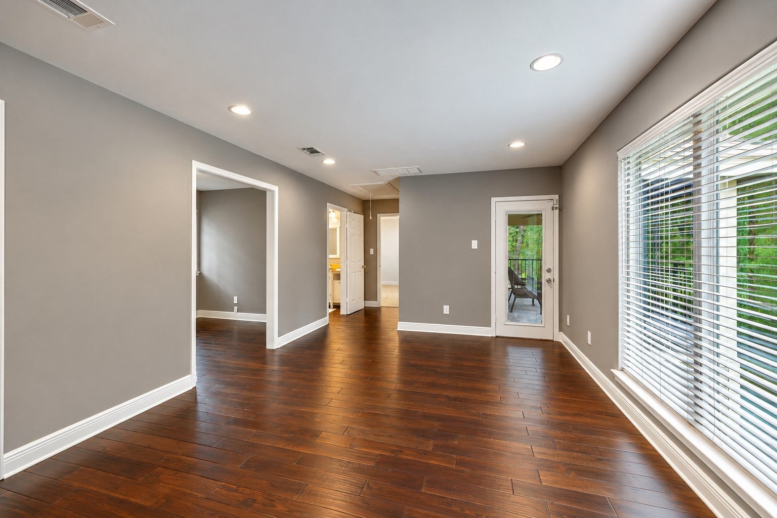 2713 N Logrun Circle, Spring, TX 77380 Shown unstaged to highlight the Bonus Rooms generous proportions, engineered wood floors & open layoutan exceptionally flexible space ready to adapt to the next owners needs.