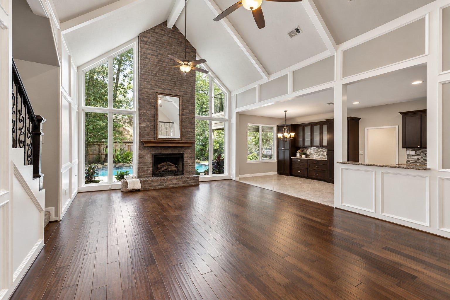 2713 N Logrun Circle, Spring, TX 77380 Shown unstaged. The vaulted ceilings soar to 19'. Architectural details abound and provide an interesting backdrop for any decorating style