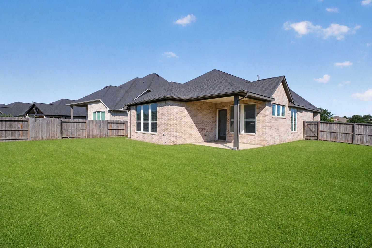 24638 Carleton Lake Lane, Tomball, TX 77375 Spacious backyard has ample room for kids to run around and play.