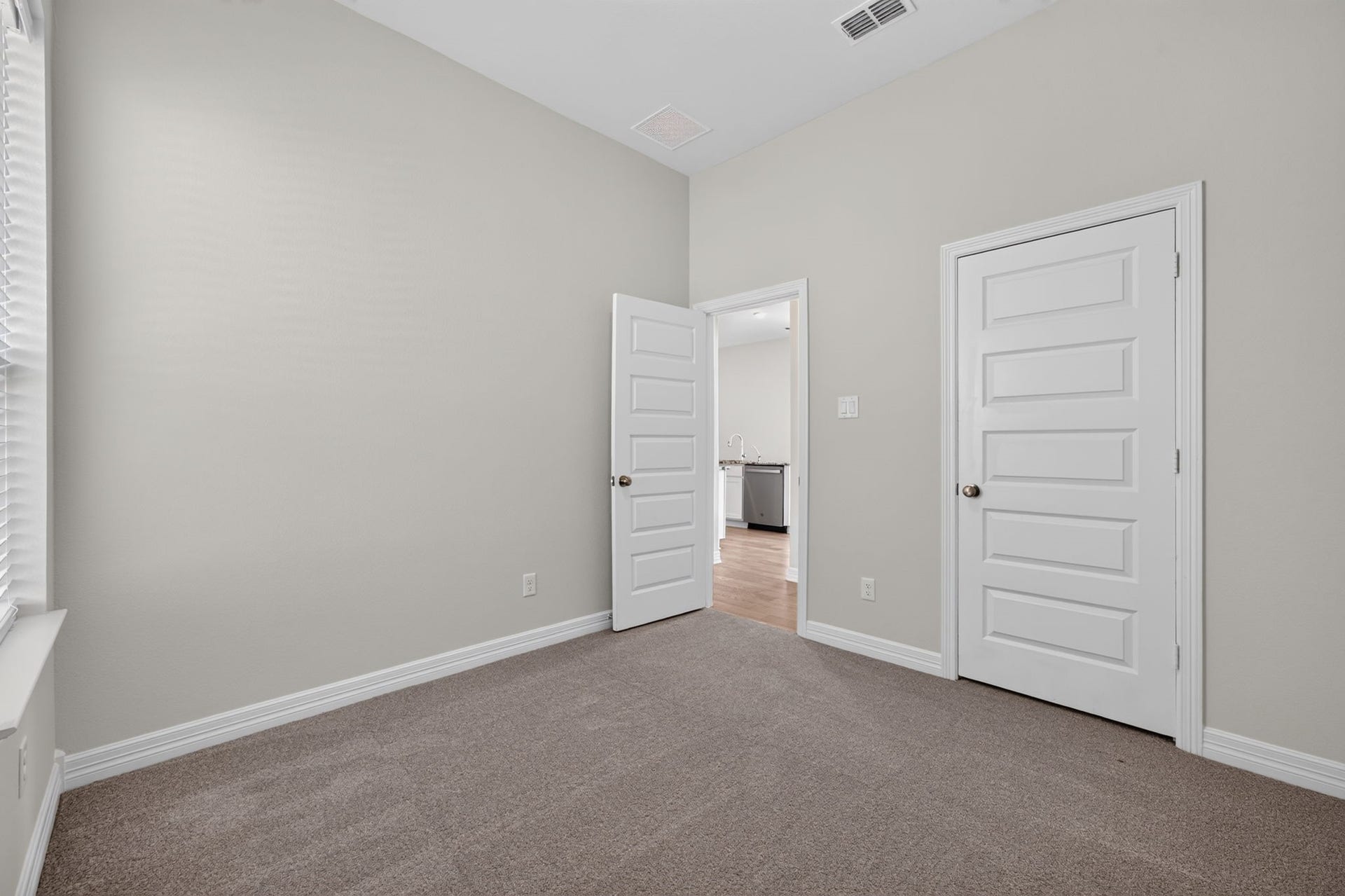 24638 Carleton Lake Lane, Tomball, TX 77375 Bedroom 2 has new carpet and paint and to go with any decor. Walk-in closet is a great feature.