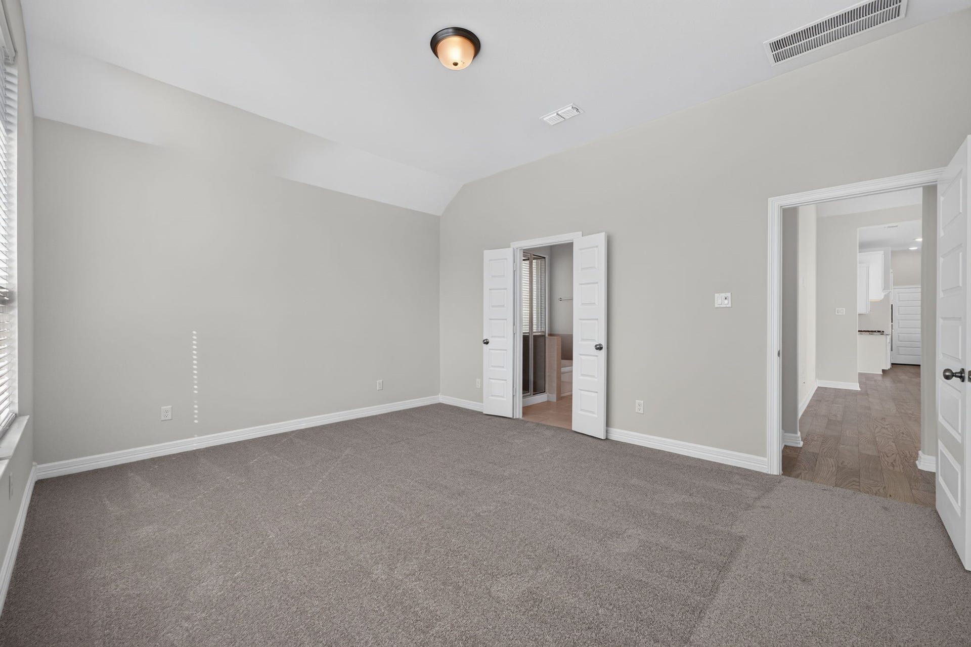 24638 Carleton Lake Lane, Tomball, TX 77375 Primary suite looks inviting with new carpet and paint in warm neutral gray colors to go with any decor.