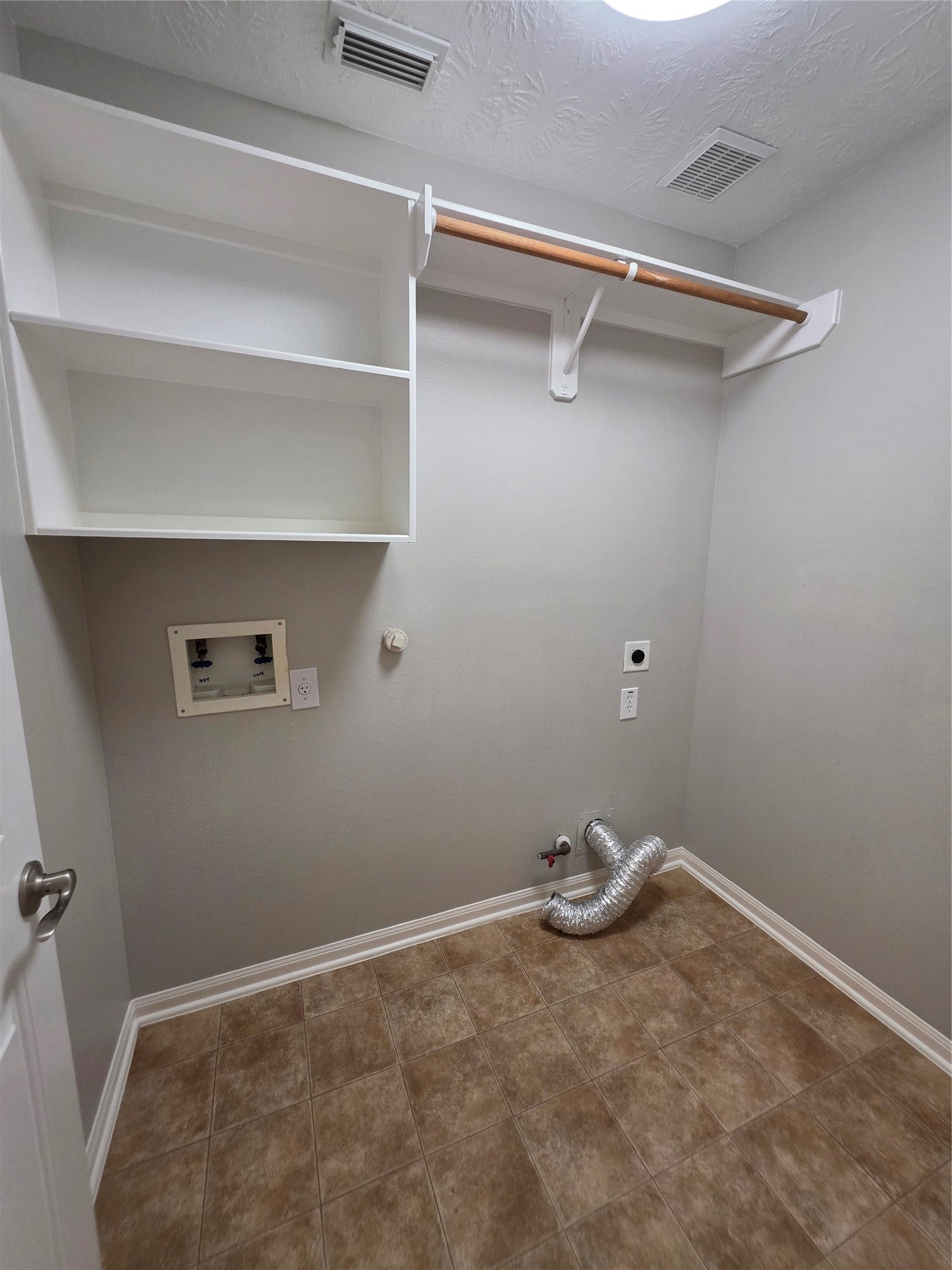 5221 Cottonwood Creek Lane, League City, TX 77573 In-house laundry room.