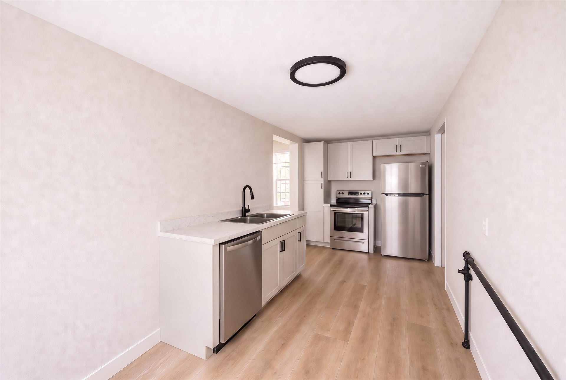Light finishes give this kitchen a clean, contemporary feel.
