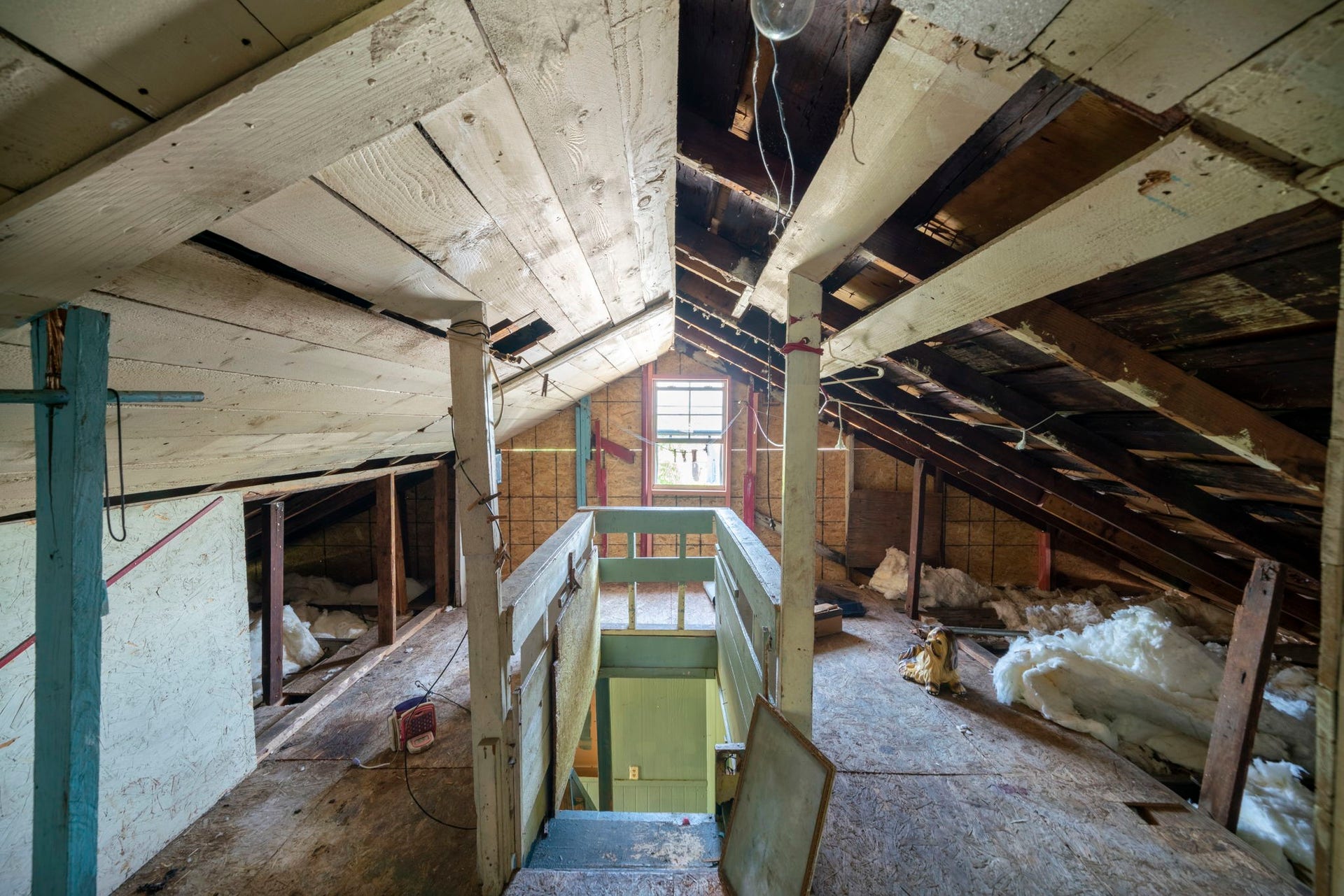 Existing loft-style space with distinctive ceiling lines.