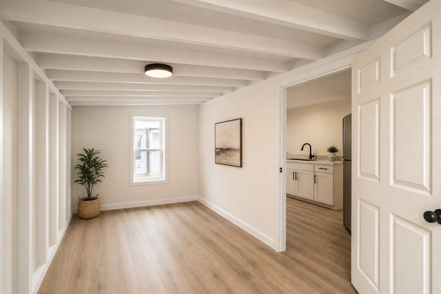 Soft finishes create a welcoming upper-level retreat.