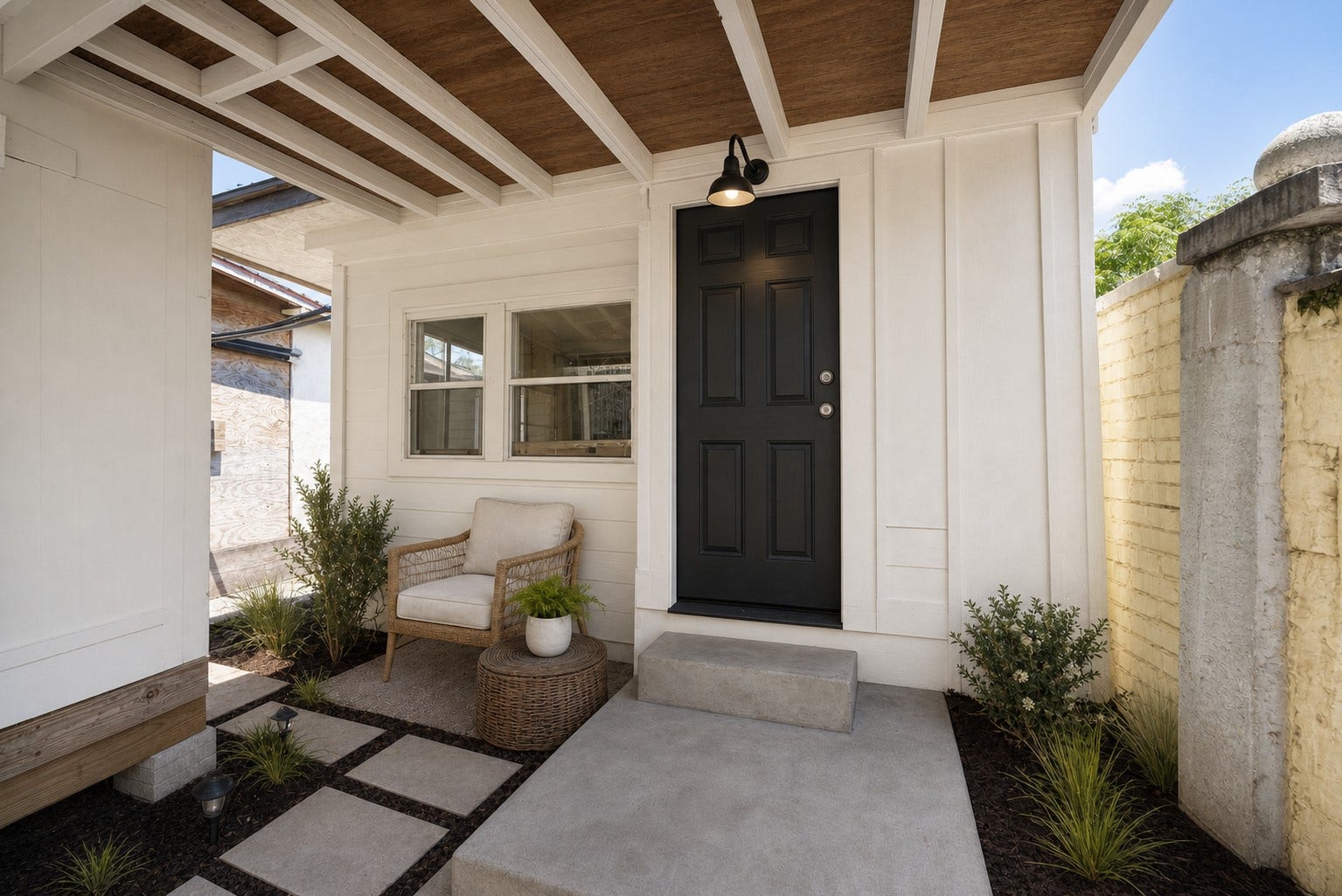 A refreshed cottage entry gives this residence a memorable arrival.