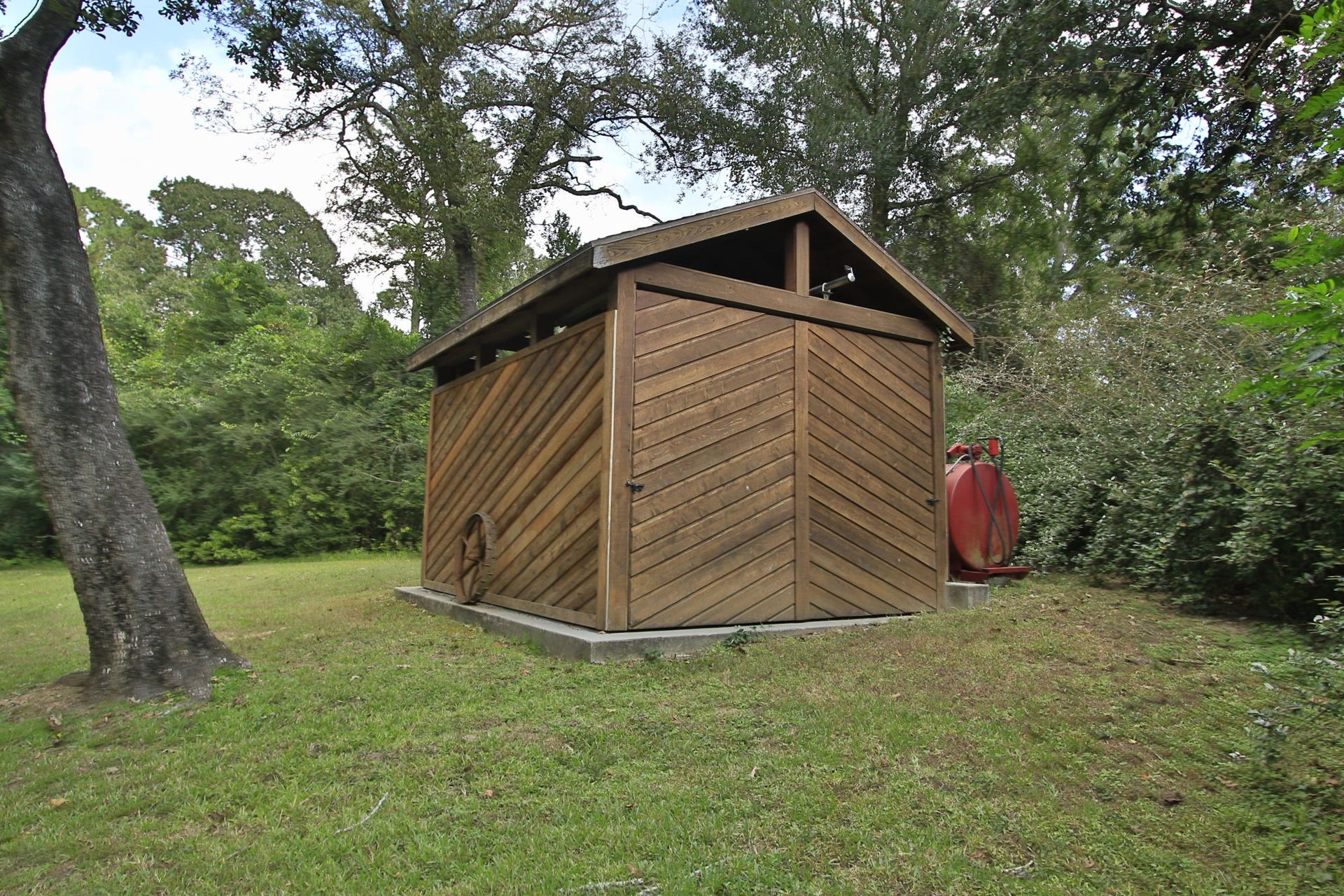 23107 Kobs Road, Tomball, TX 77377 The wooden building houses the huge generator for the property!