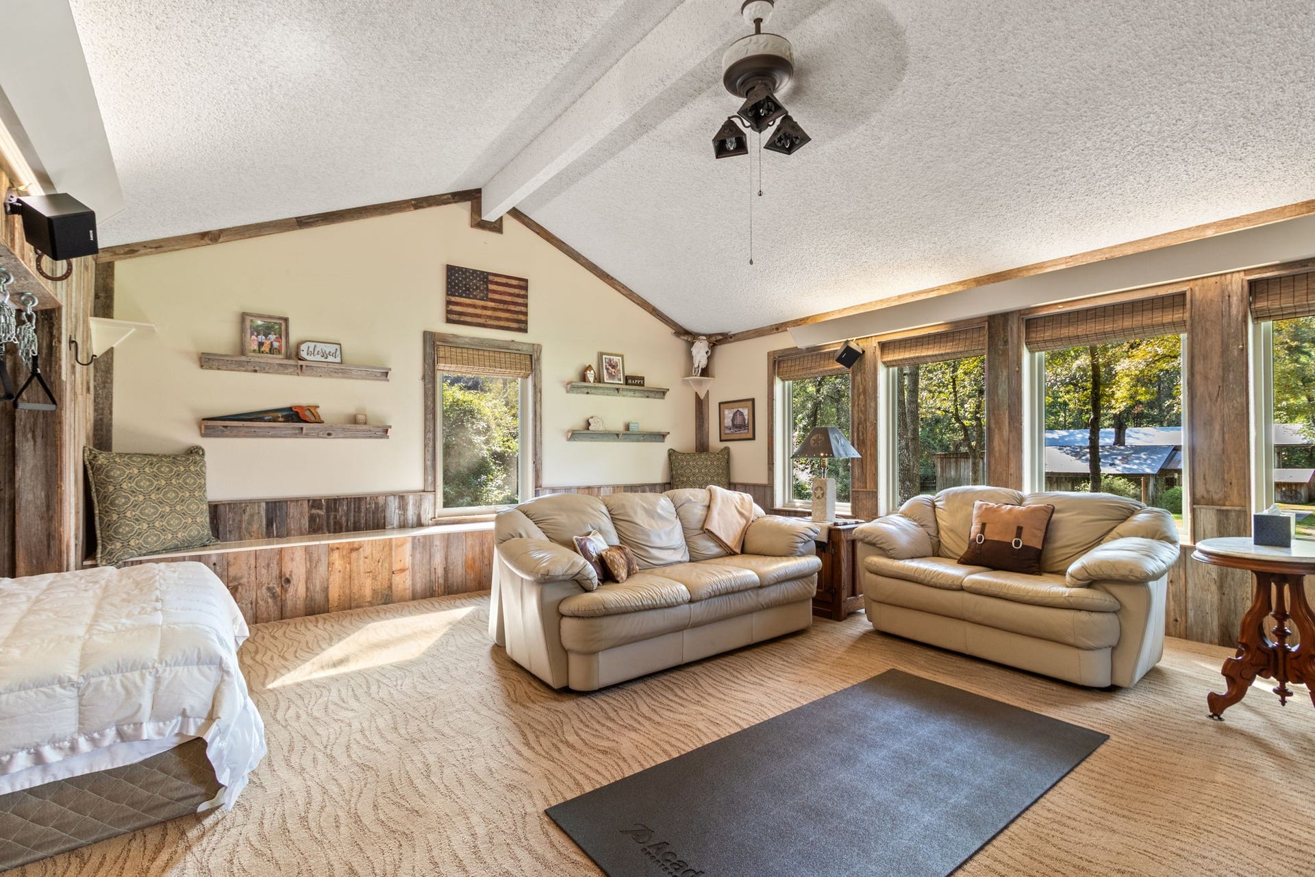 23107 Kobs Road, Tomball, TX 77377 Discover the perfect upstairs retreat with a versatile game room and guest bed, darling window seat, enhanced by stunning backyard views through expansive windows.