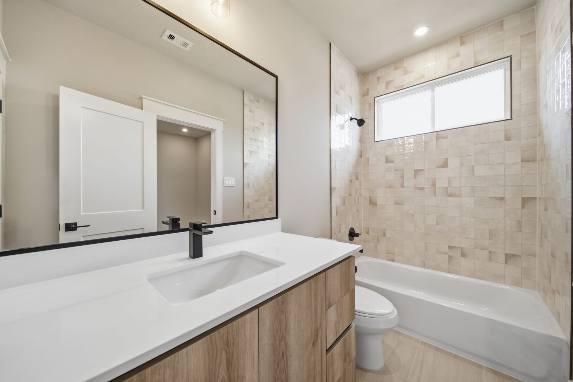 full bathroom attached to secondary bedroom
