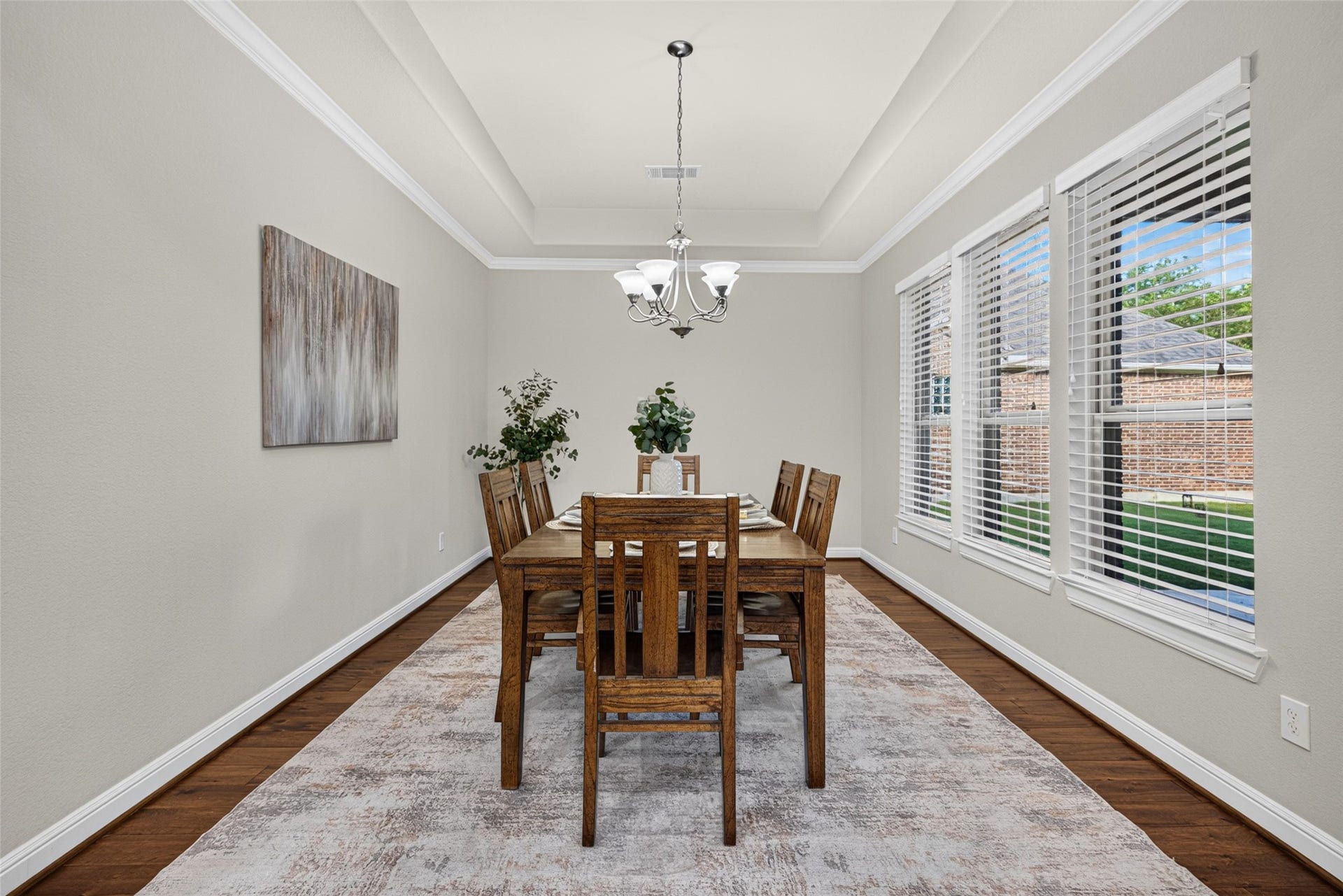 5811 Caper Shores Lane, Sugar Land, TX 77479 The dedicated dining area offers a warm and inviting setting for family meals and special occasions.