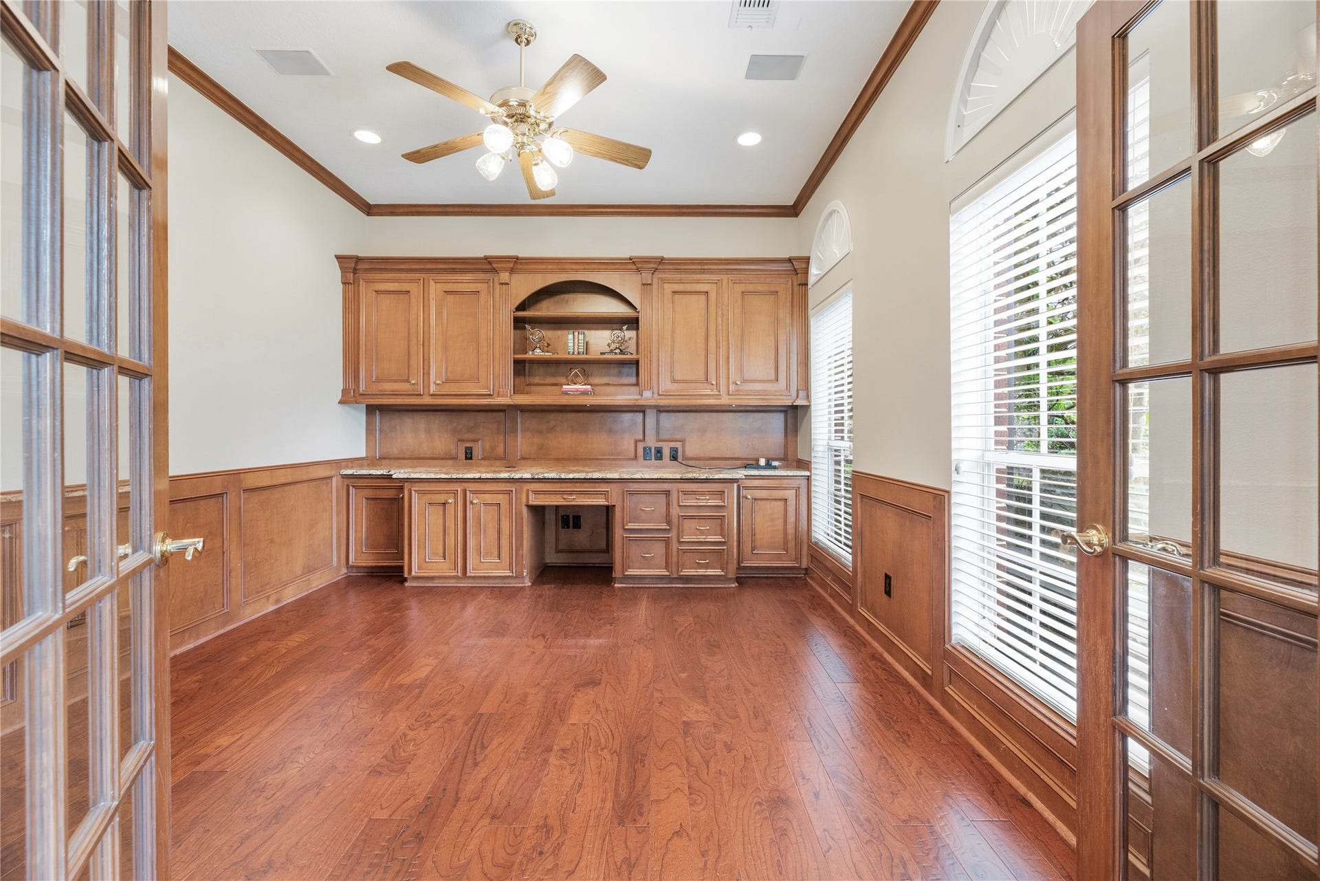 13915 Springmint Drive, Cypress, TX 77429 Handsome home office just off the entry with custom built-ins and French doors for privacy.