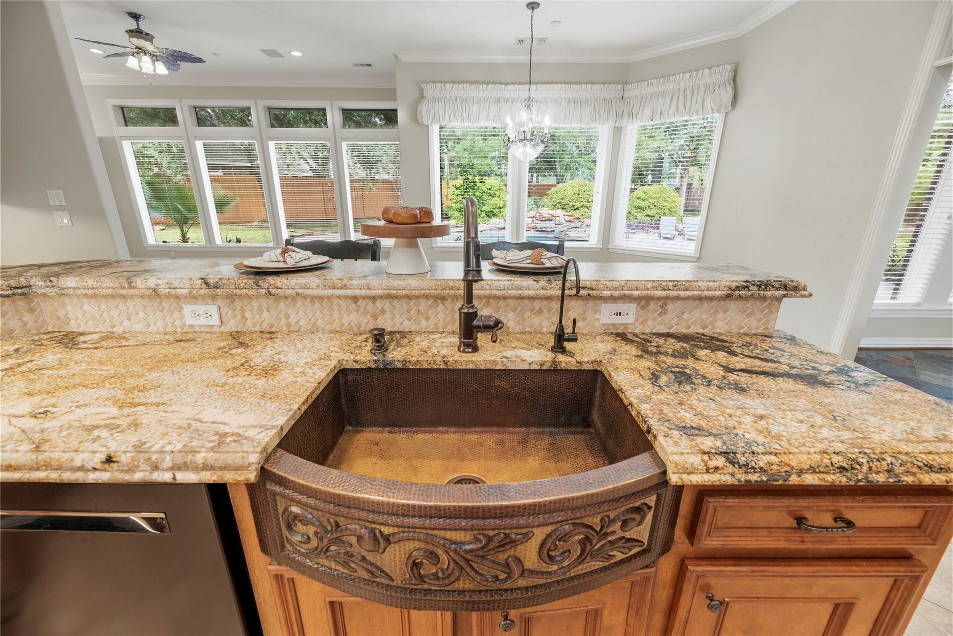 13915 Springmint Drive, Cypress, TX 77429 Stunning hammered copper farmhouse sink with ornate detailing.