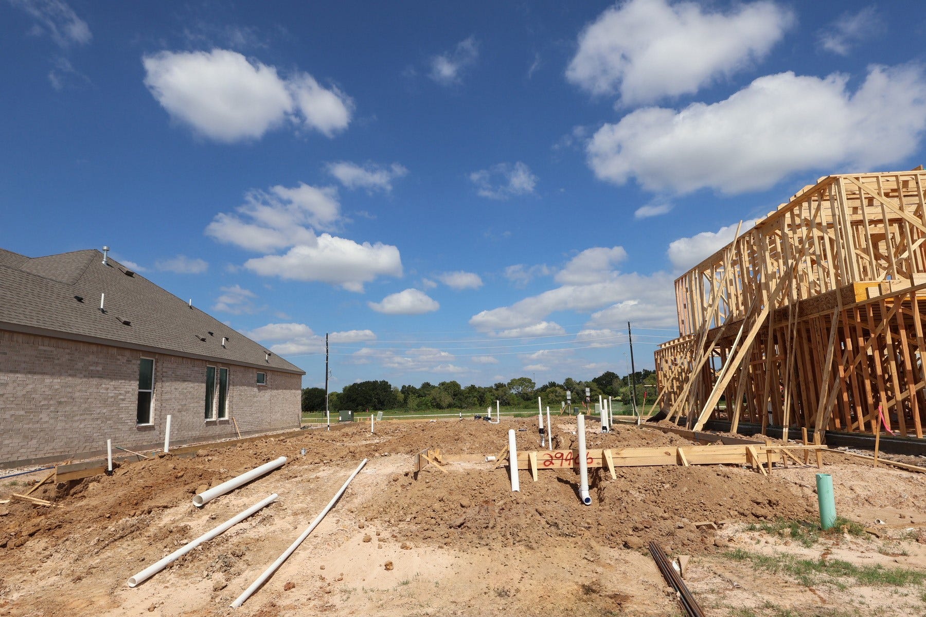 Two story home with 5 beds, 4.5 baths, and 3 car tandem garage
