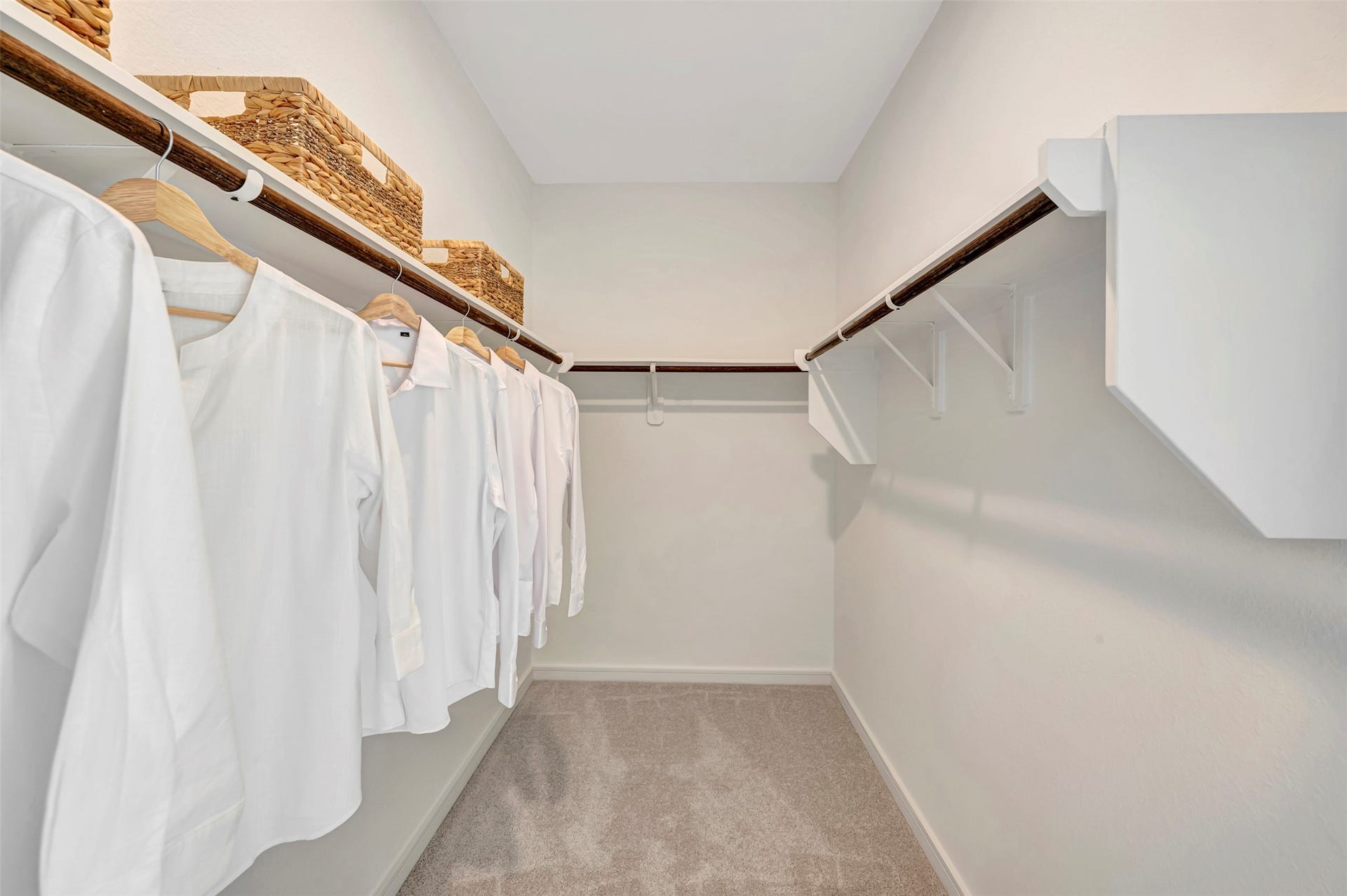 Primary walk-in closet (*Photo not of actual home and used for illustration purposes only.)