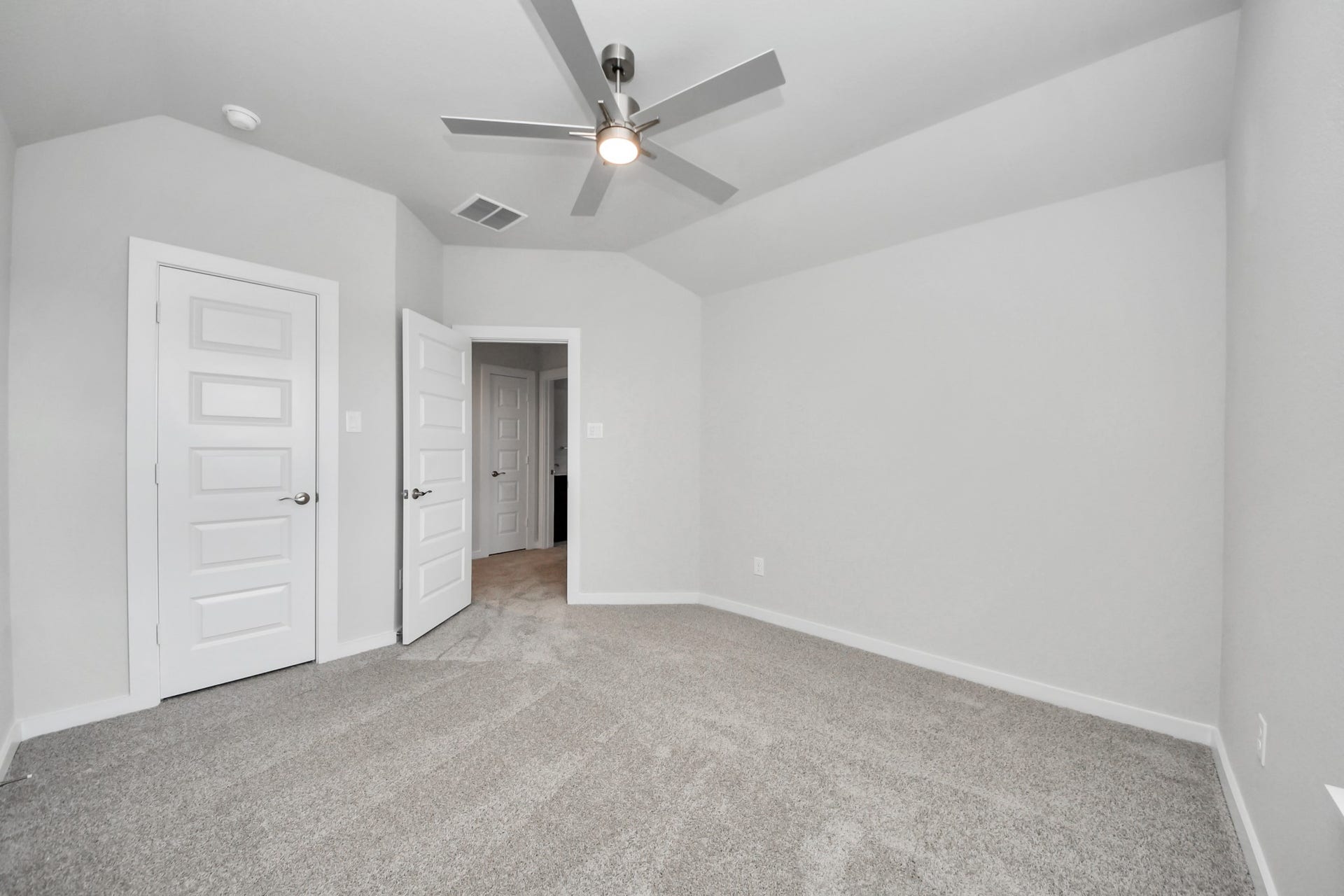 3213 Skerne Spring Drive, Spring, TX 77373 Generously sized secondary bedrooms featuring spacious closets, soft and inviting carpeting underfoot, large windows allowing plenty of natural light, and the added touch of privacy blinds for your personal retreat. Sample photo of completed home with similar floor plan. Actual colors and selections may vary.