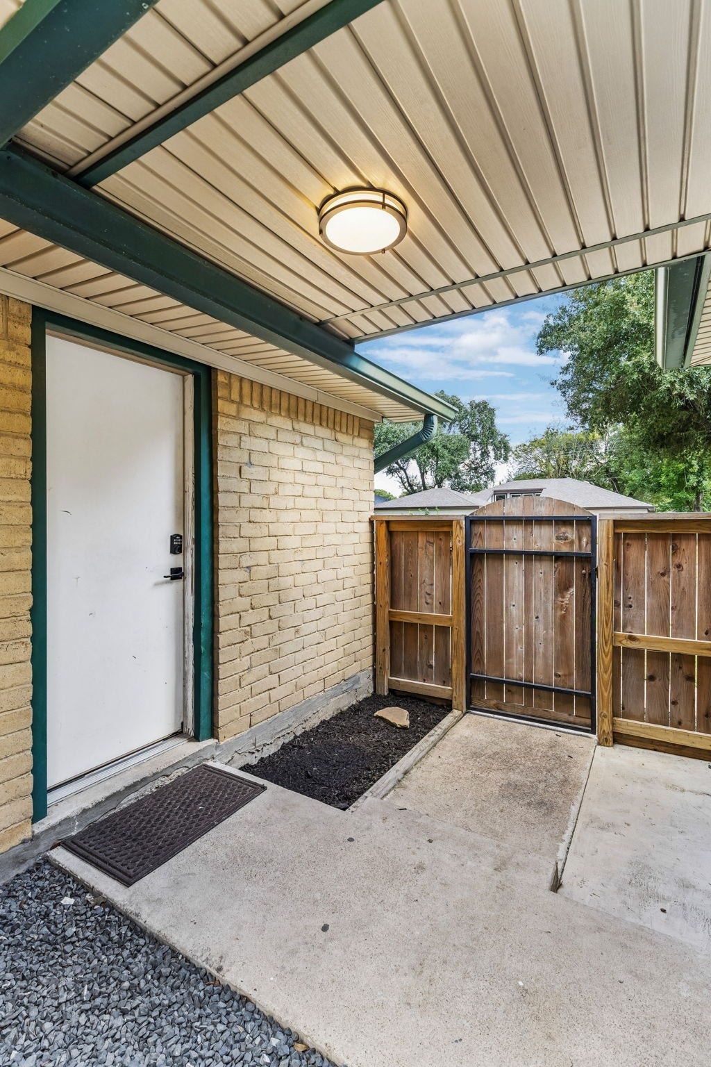 7803 Blackjack Court, Houston, TX 77088 Breezeway leading to garage.