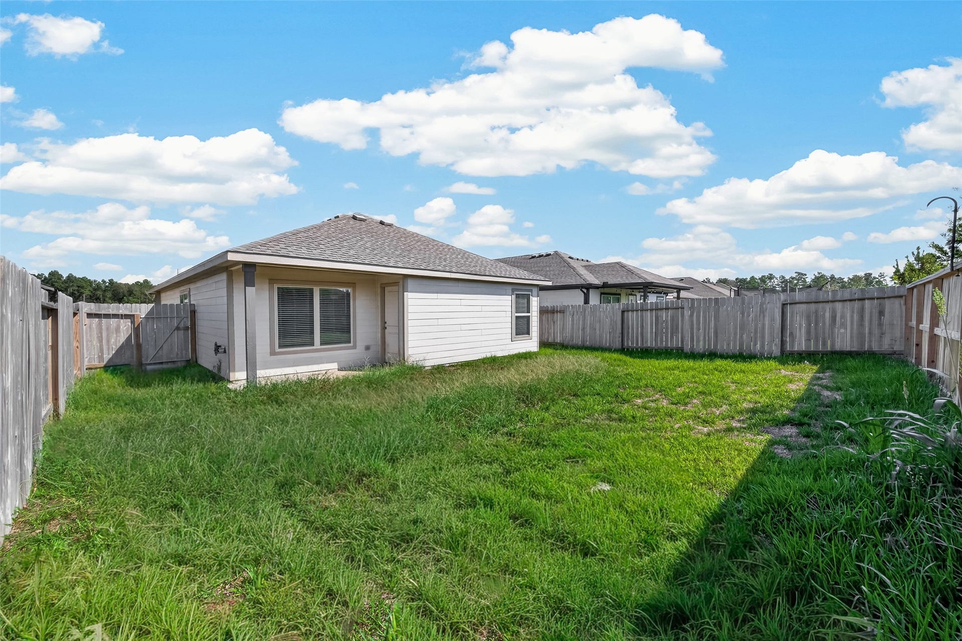 25471 Blue Mistflower Drive, Montgomery, TX 77316 Back yard view from other angle
