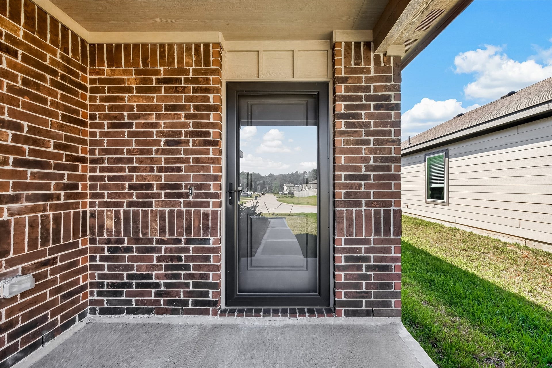 25471 Blue Mistflower Drive, Montgomery, TX 77316 Great covered porch with storm door on Entry