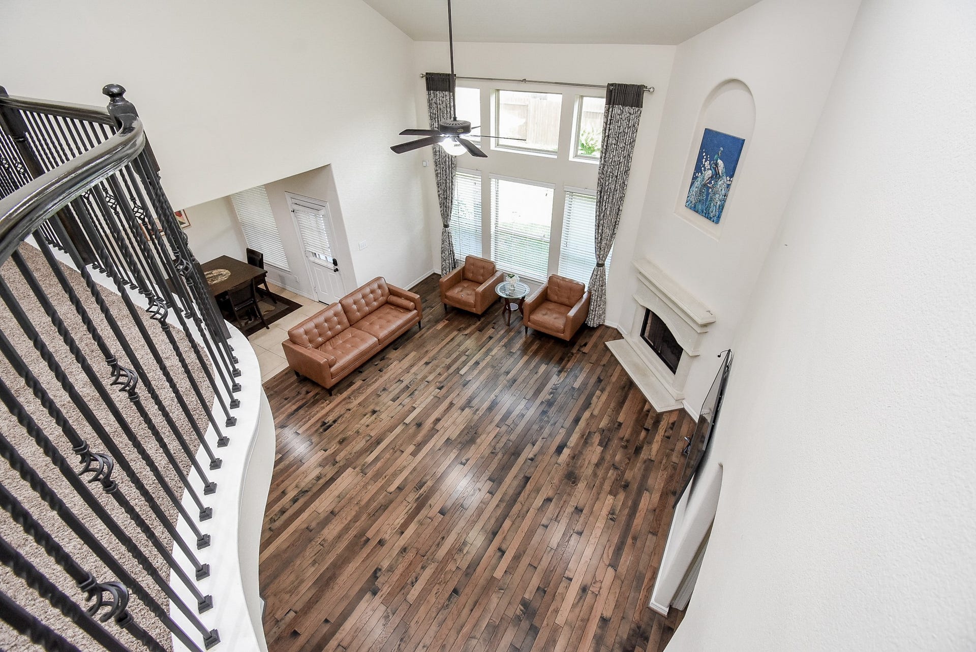 27807 Ashbrook Falls Court, Fulshear, TX 77441 View from the upstairs down into the living/breakfast area.