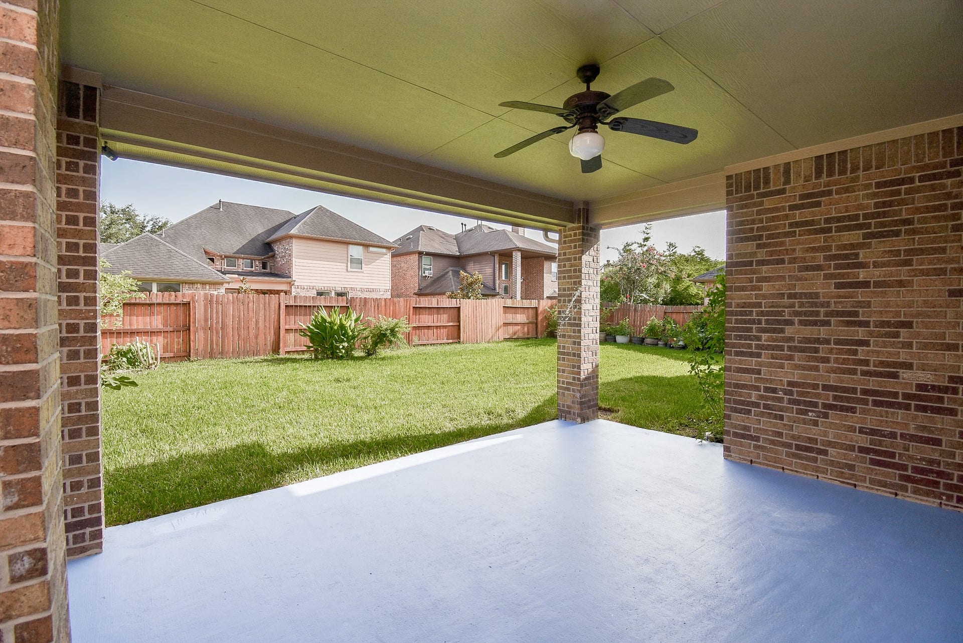 27807 Ashbrook Falls Court, Fulshear, TX 77441 Extended covered patio, fan is already installed so you can relax and enjoy the outdoors!
