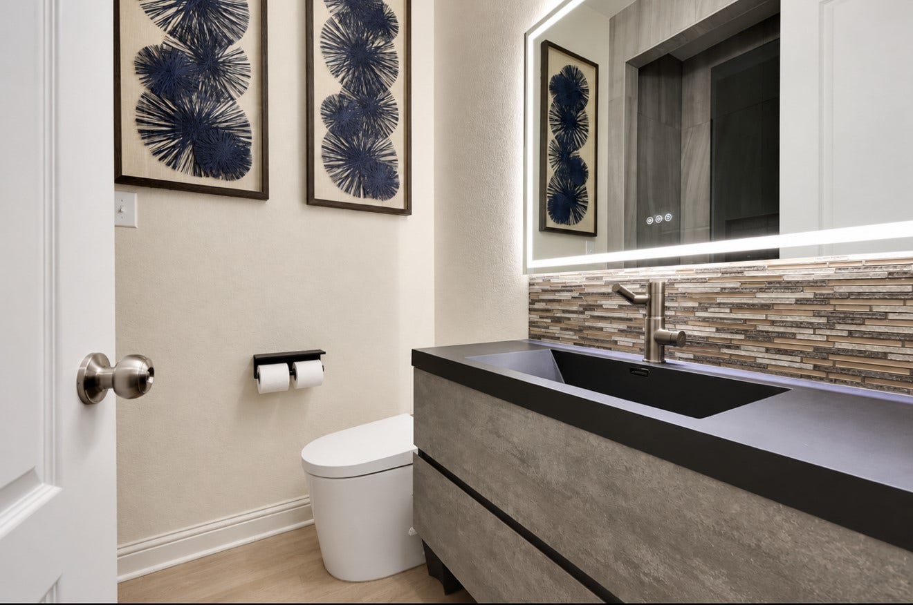 2120 Rosenthal Lane, Houston, TX 77080 Converted the downstairs half bathroom into a full bathroom with a walk-in shower.