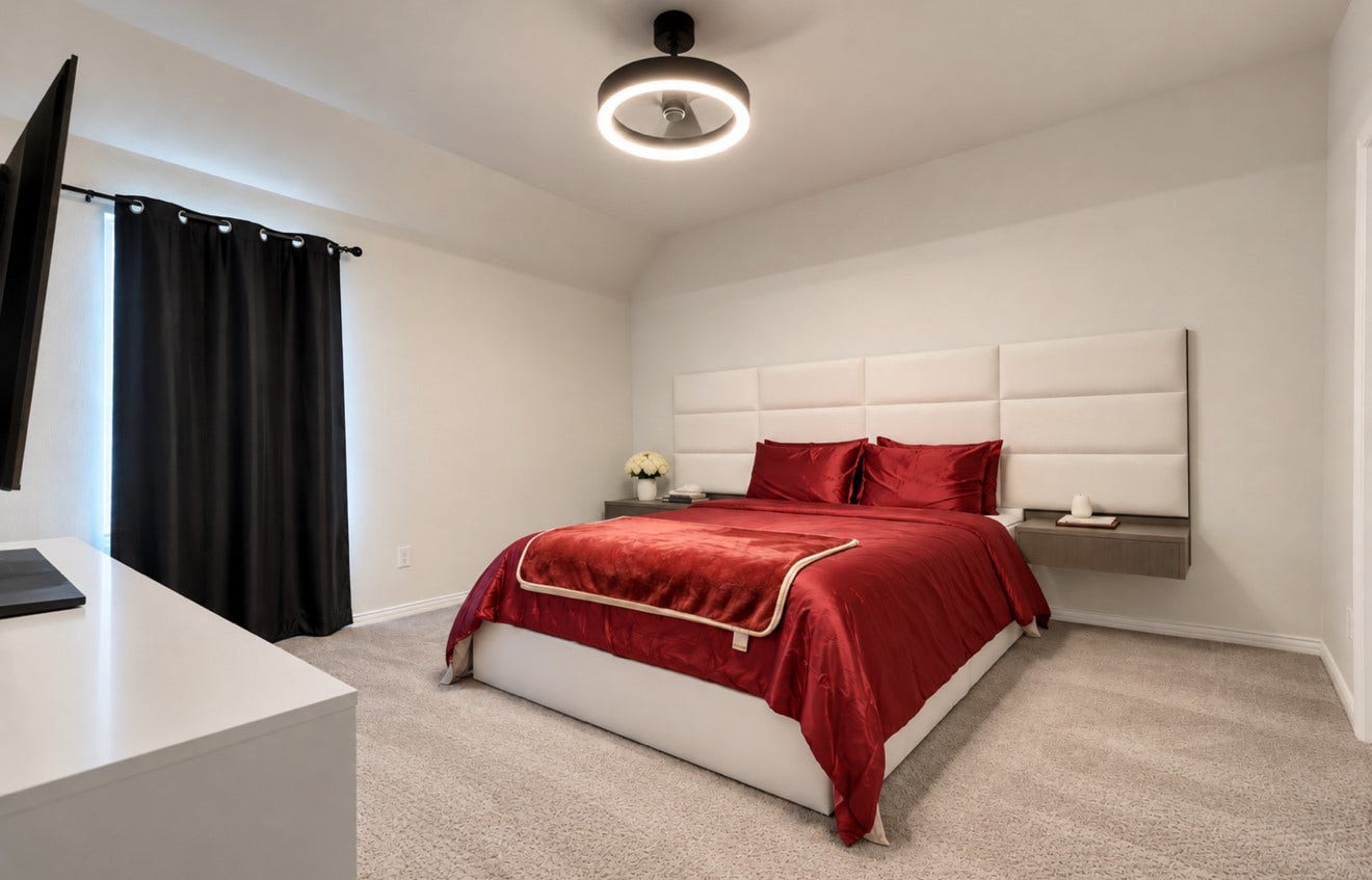 2120 Rosenthal Lane, Houston, TX 77080 Inviting upstairs bedroom ideal for family or guests. A fully renovated Jack-and-Jill bathroom connects this room to the adjacent bedroom, offering convenient shared access.