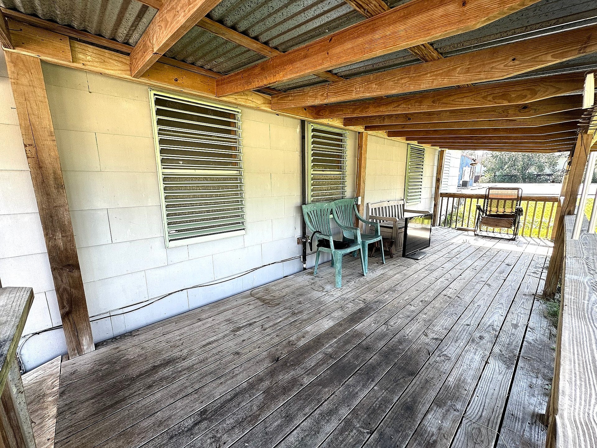 4439 9th Street, Bacliff, TX 77518 Very comfortable front porch space perfect for morning coffee.