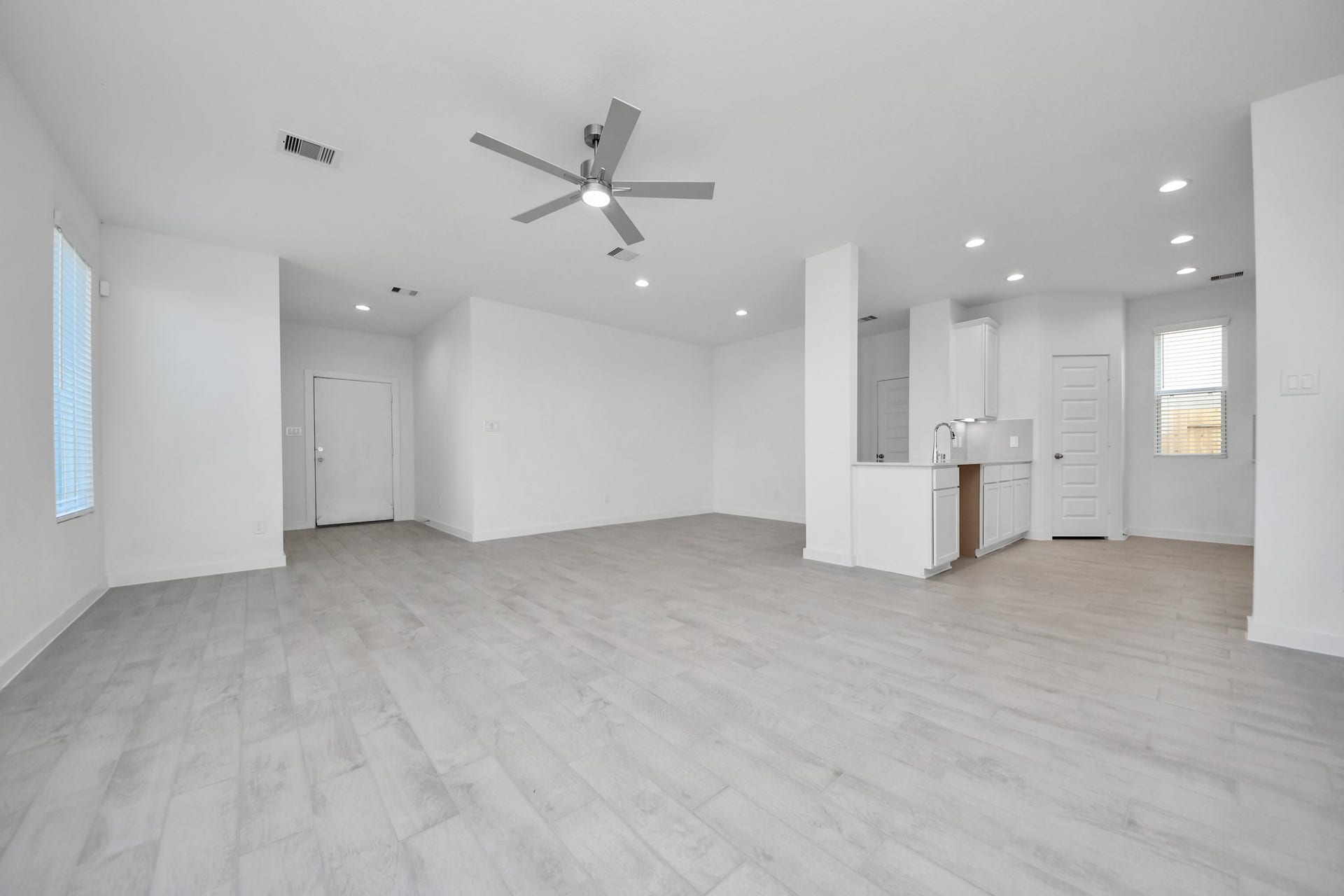 18551 Athena Flower Drive, Fresno, TX 77545 Take another glimpse into the heart of the home with this additional view of the family rooma sprawling space ready to accommodate all your gatherings. Sample photo of completed home with similar floor plan. Actual colors and selections may vary.