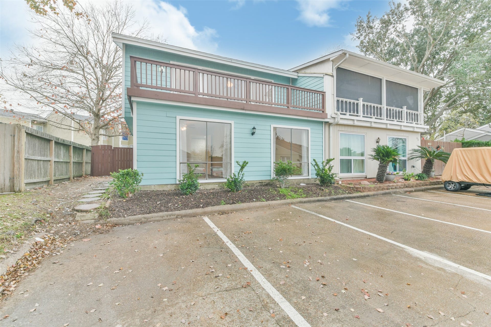 Adorable townhome in April Sound with parking right outside the unit.