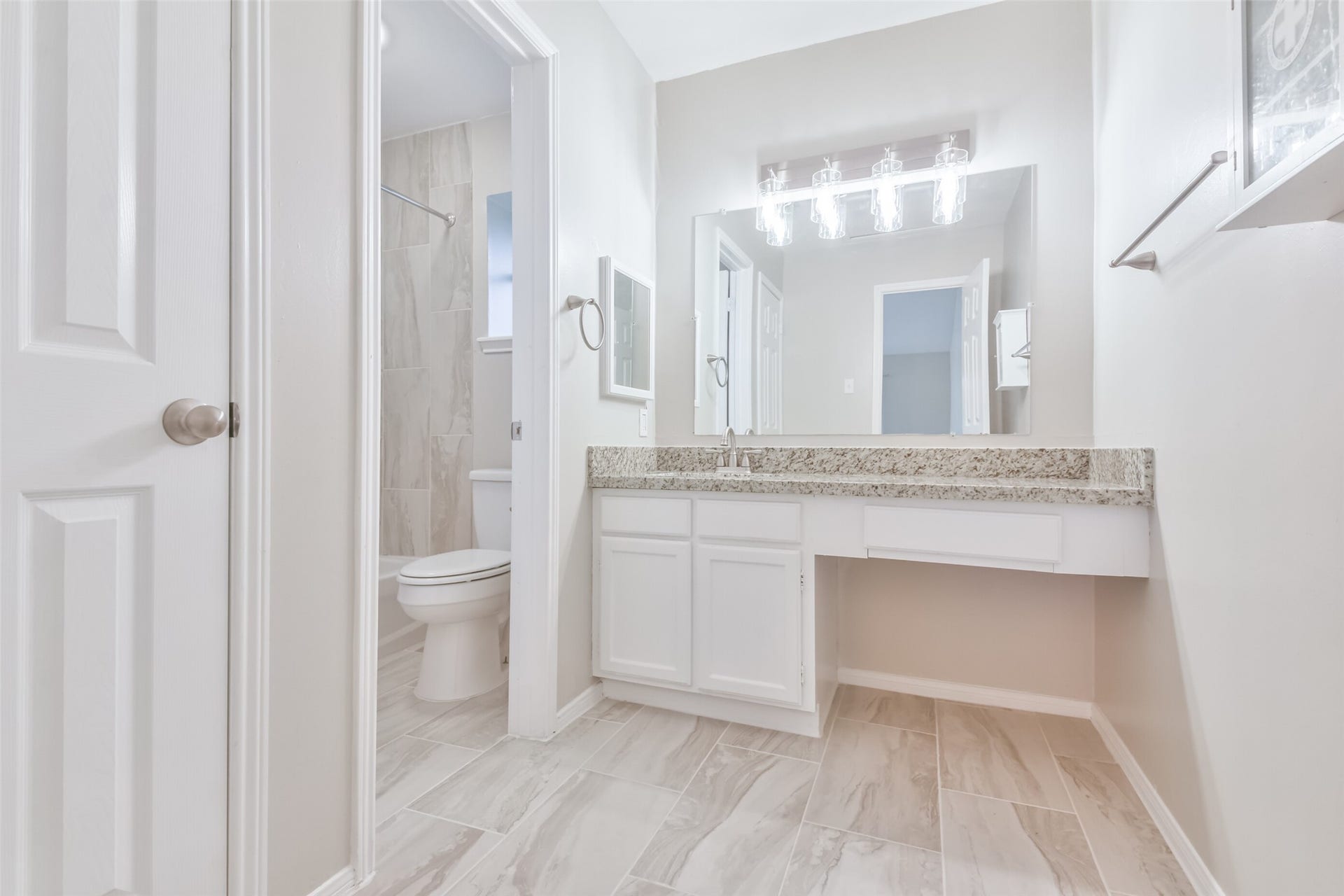 Recently renovated bathrooms with modern finishes.