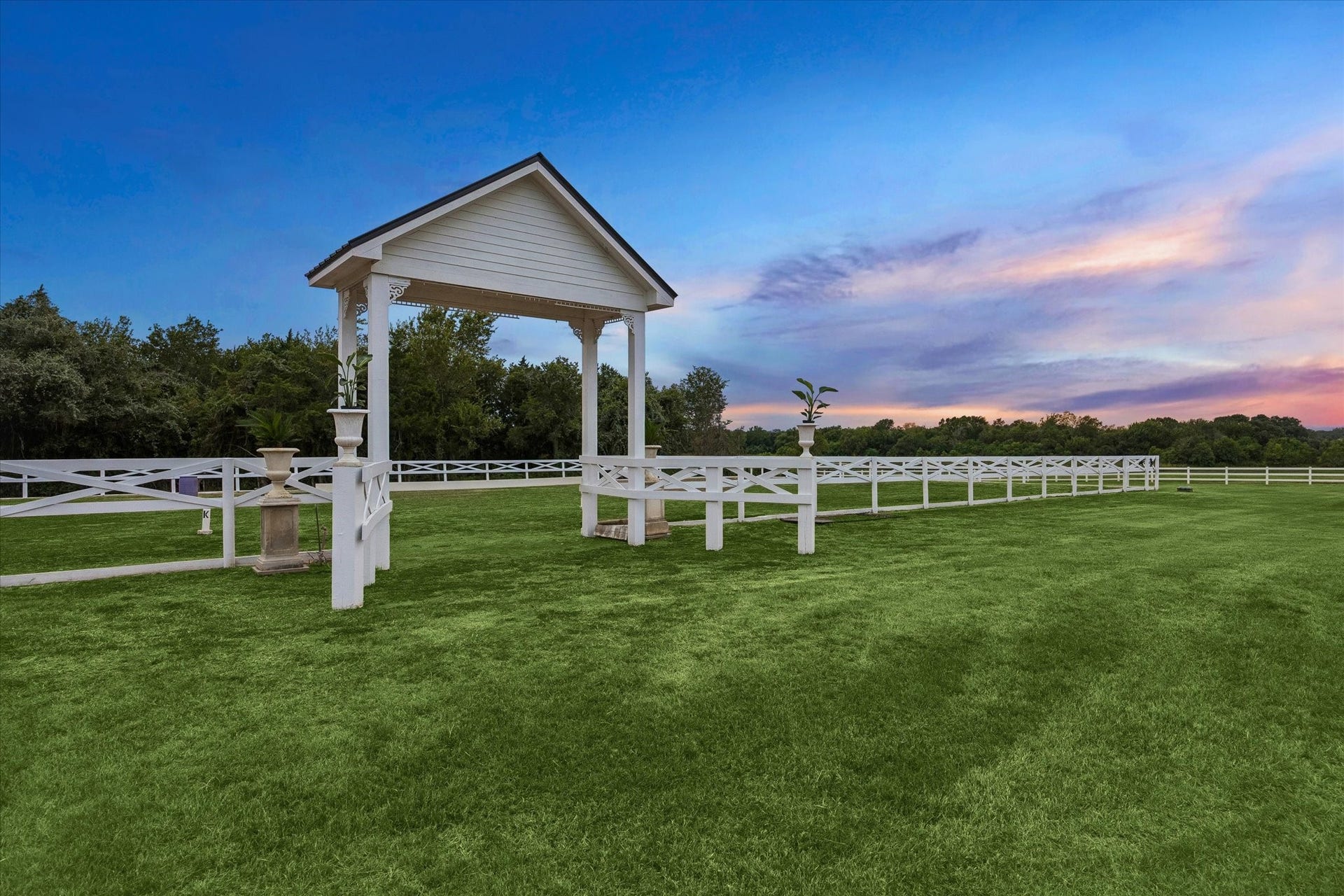 4050 Fm 2714, Round Top, TX 78954 Private riding arena set amid the beautiful acreage, offering an exceptional equestrian amenity with picturesque countryside views.